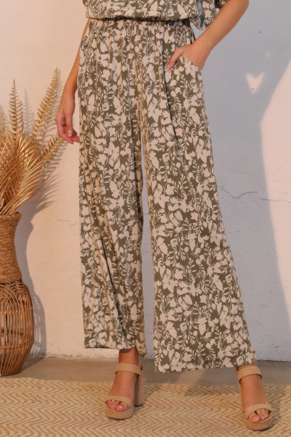 Olive floral pocket pants with wide-leg drape and elastic waistband