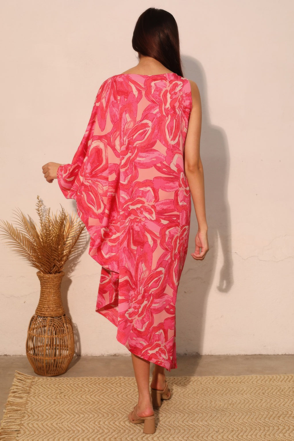 Petal print one-sleeve dress, pink, back view with cape-like draped sleeve