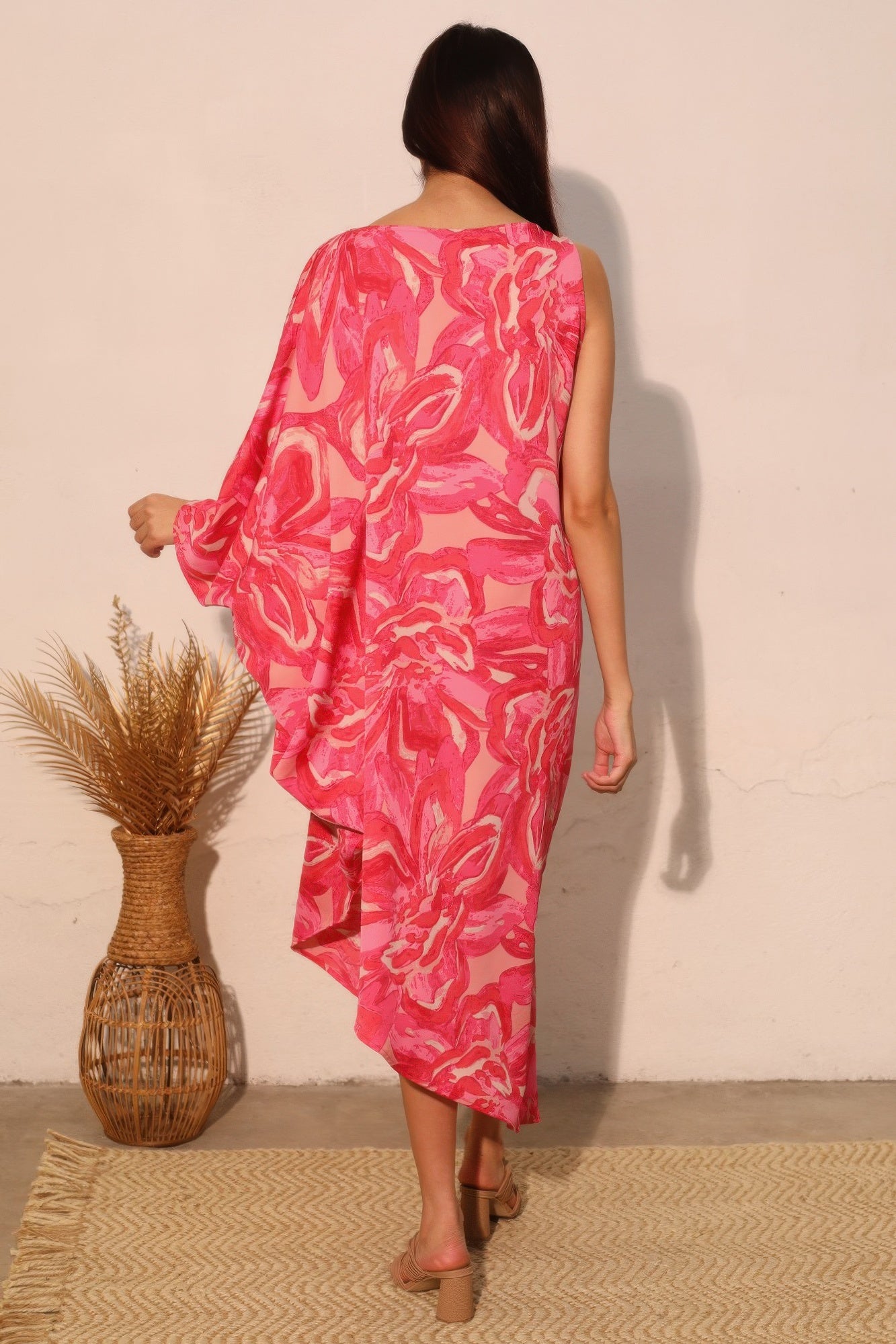 Petal print one-sleeve dress, pink, back view with cape-like draped sleeve
