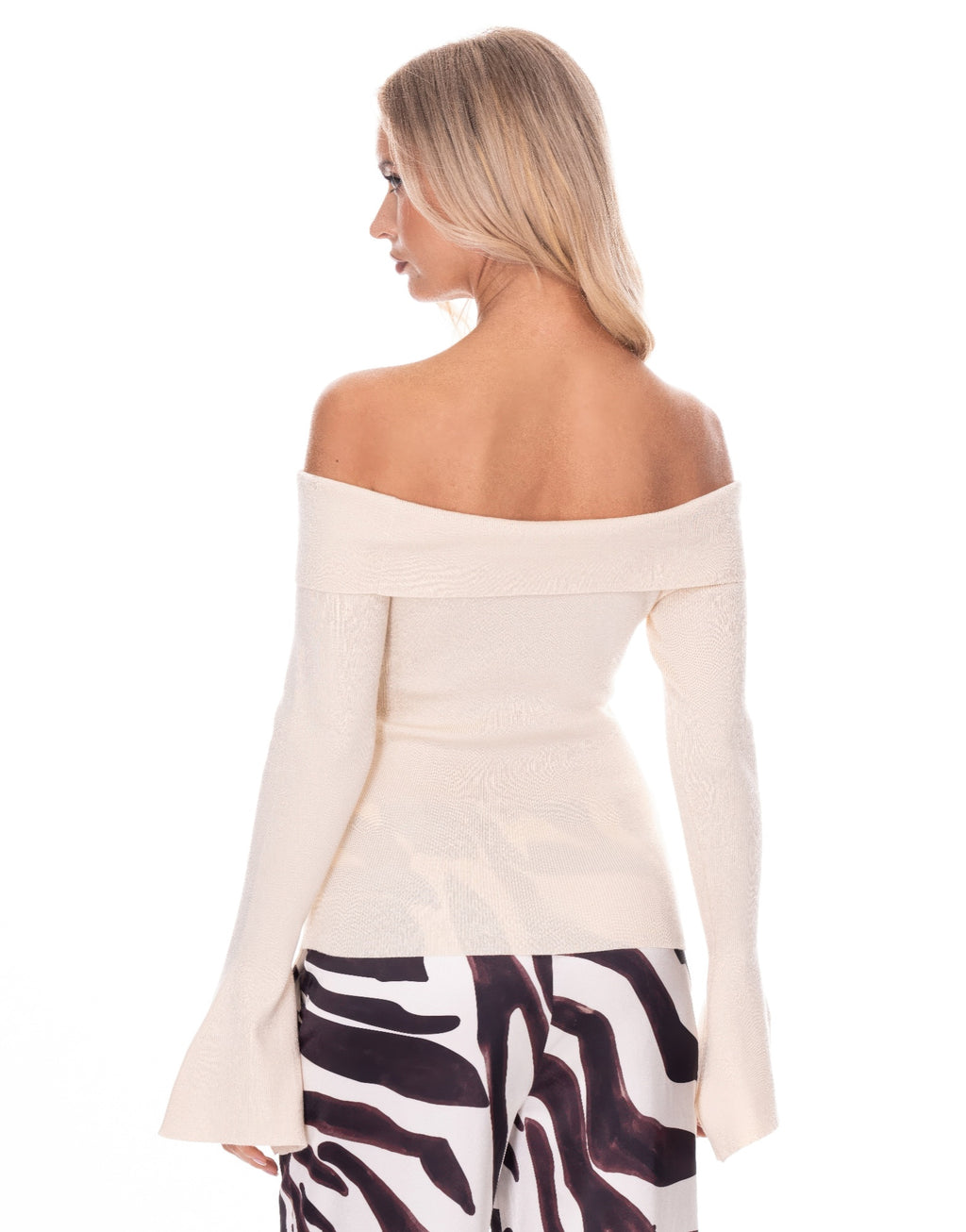 Beige knit off-shoulder top, back view with flared long sleeves