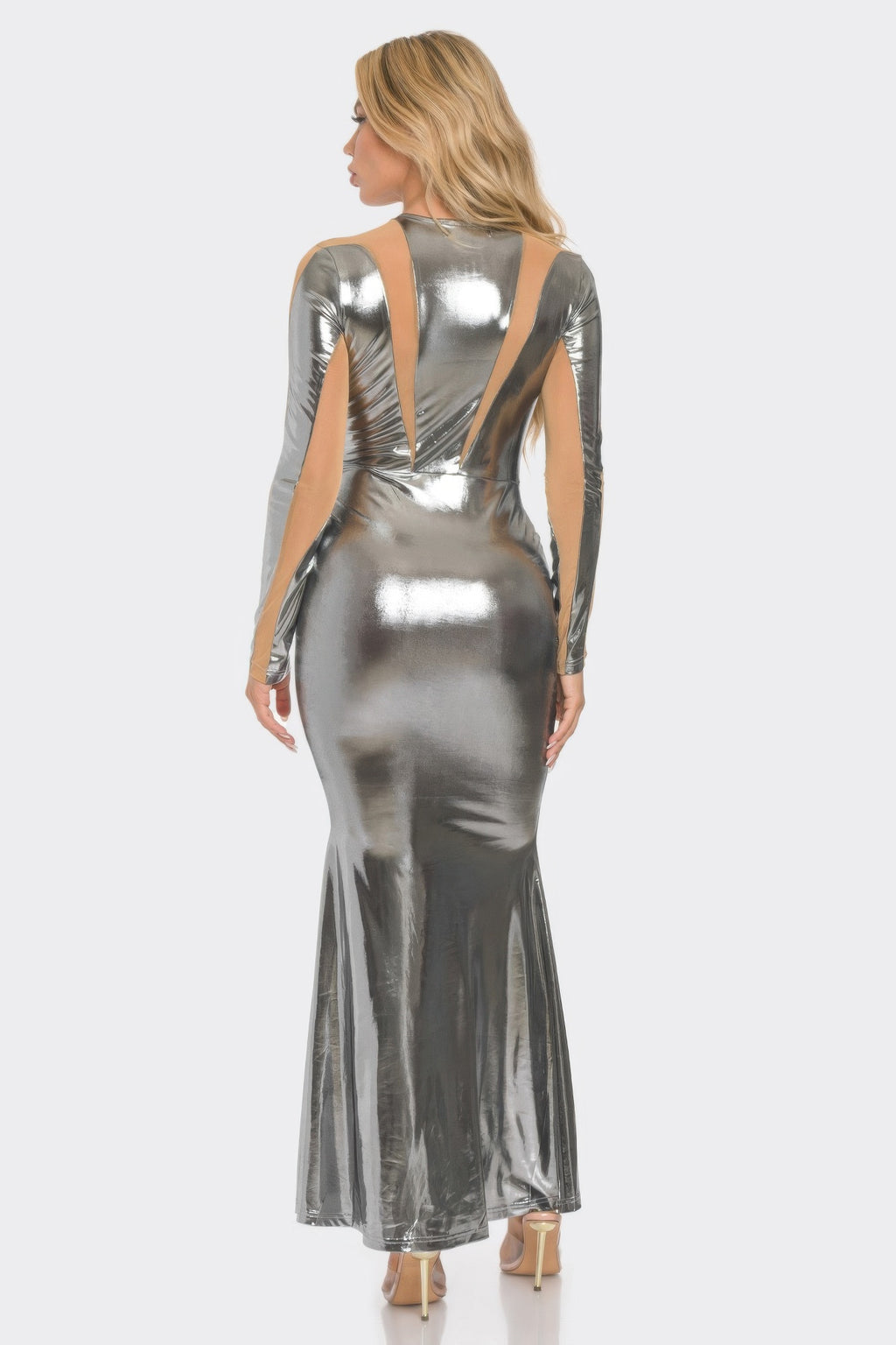 Back view of metallic silver mesh cut-out maxi dress with vertical open panel detail