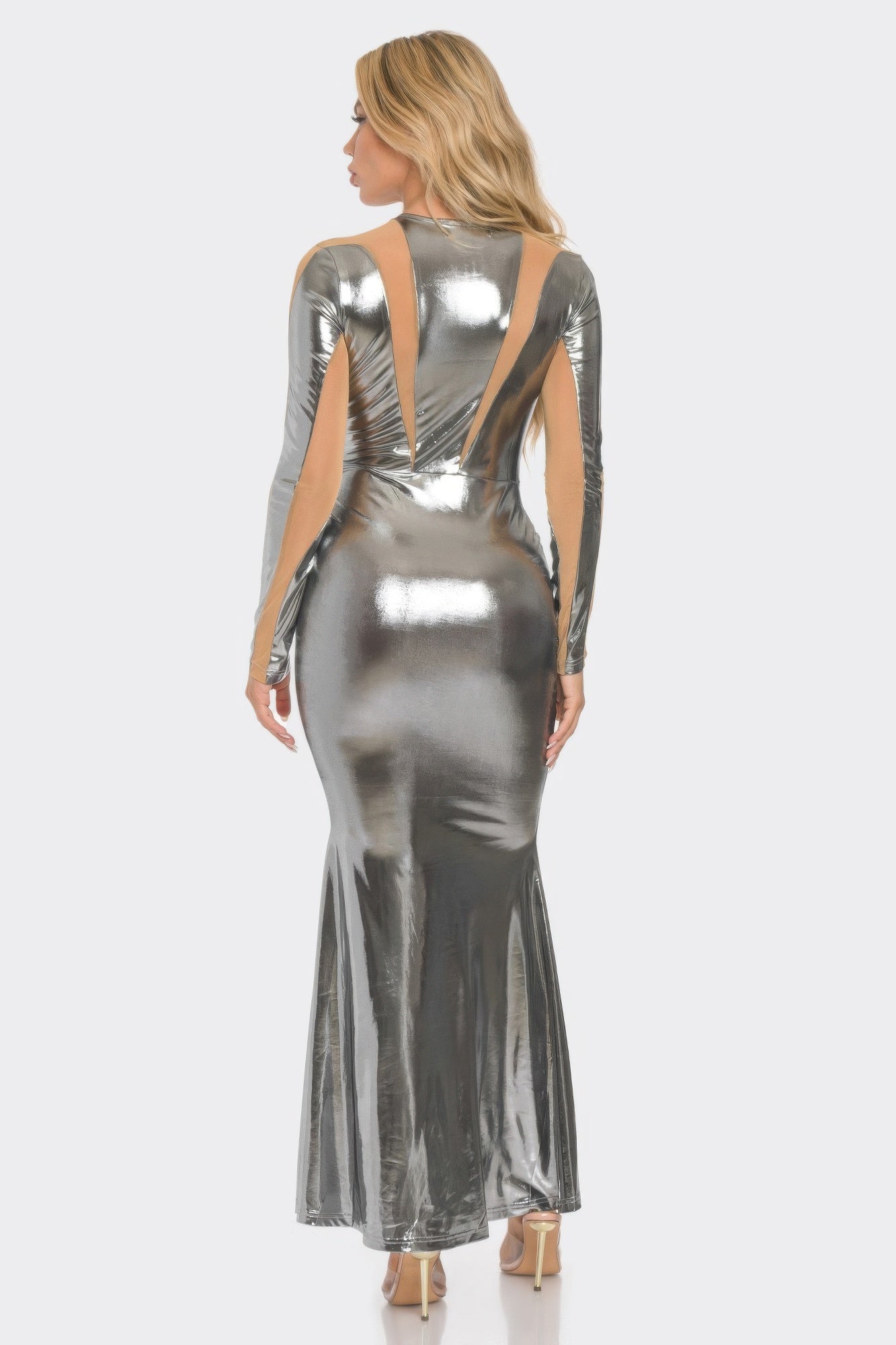 Back view of metallic silver mesh cut-out maxi dress with vertical open panel detail
