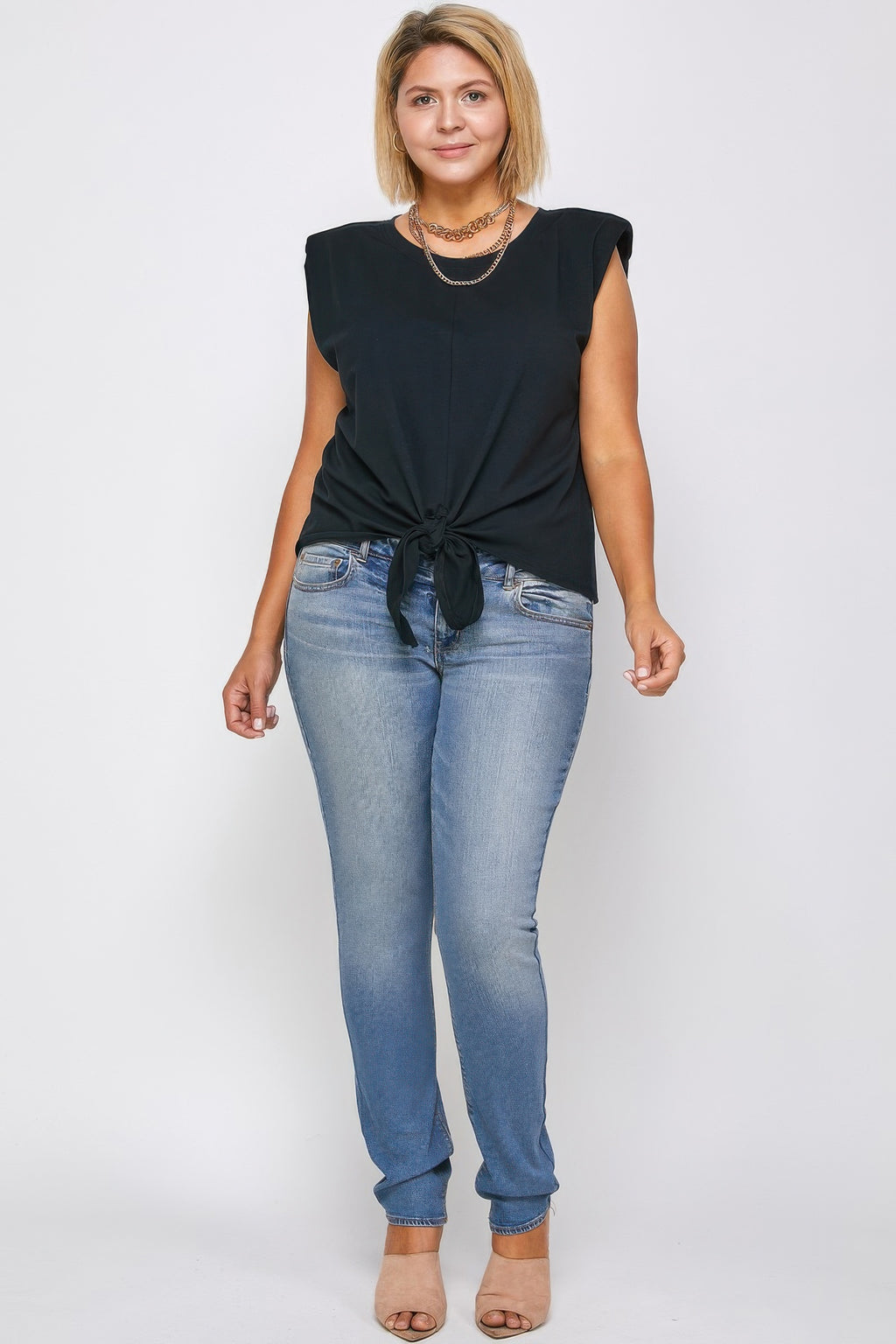 Padded shoulder top, sleeveless dark knit with knotted hem