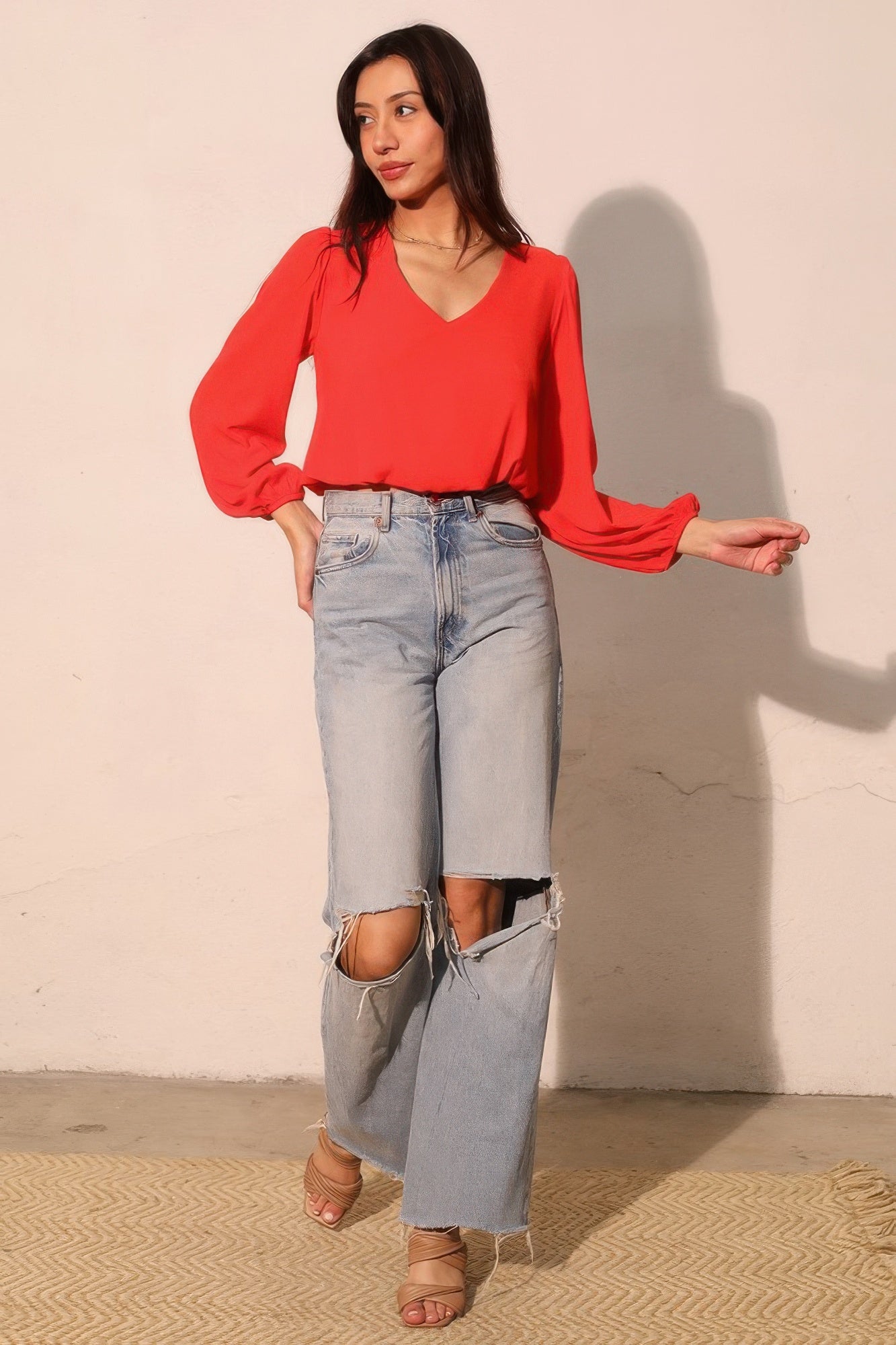 Tomato red V-neck long-sleeve crop top, relaxed fit and gathered sleeve cuffs