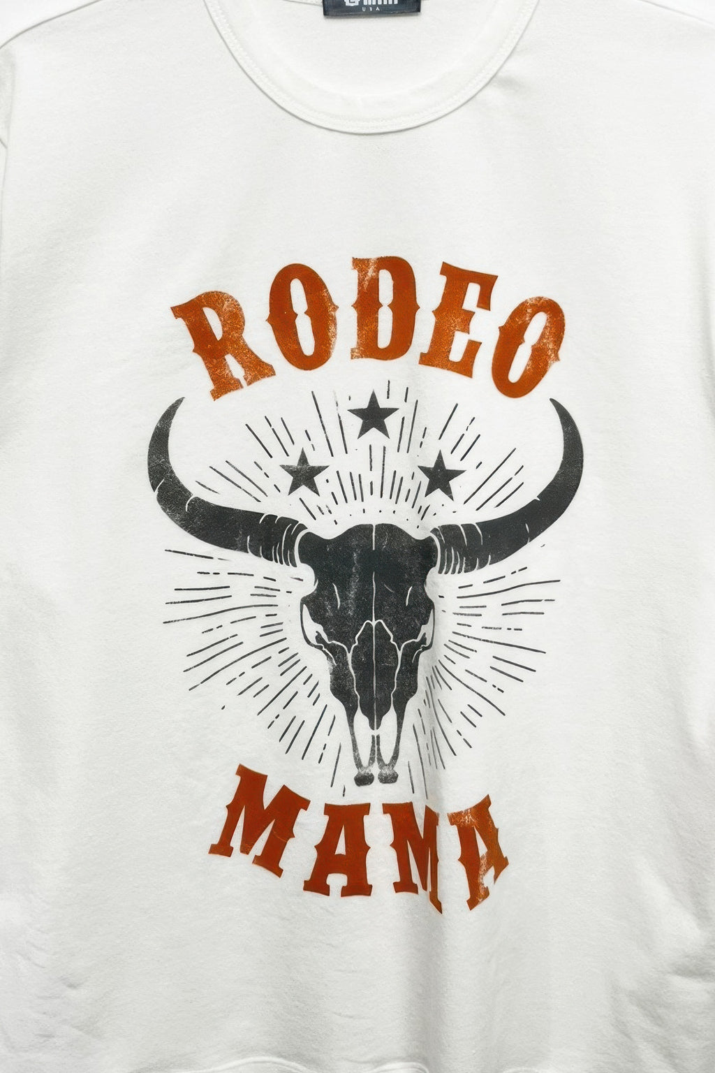 Rodeo Mama graphic print T-shirt front, bull head with stars in brown and black