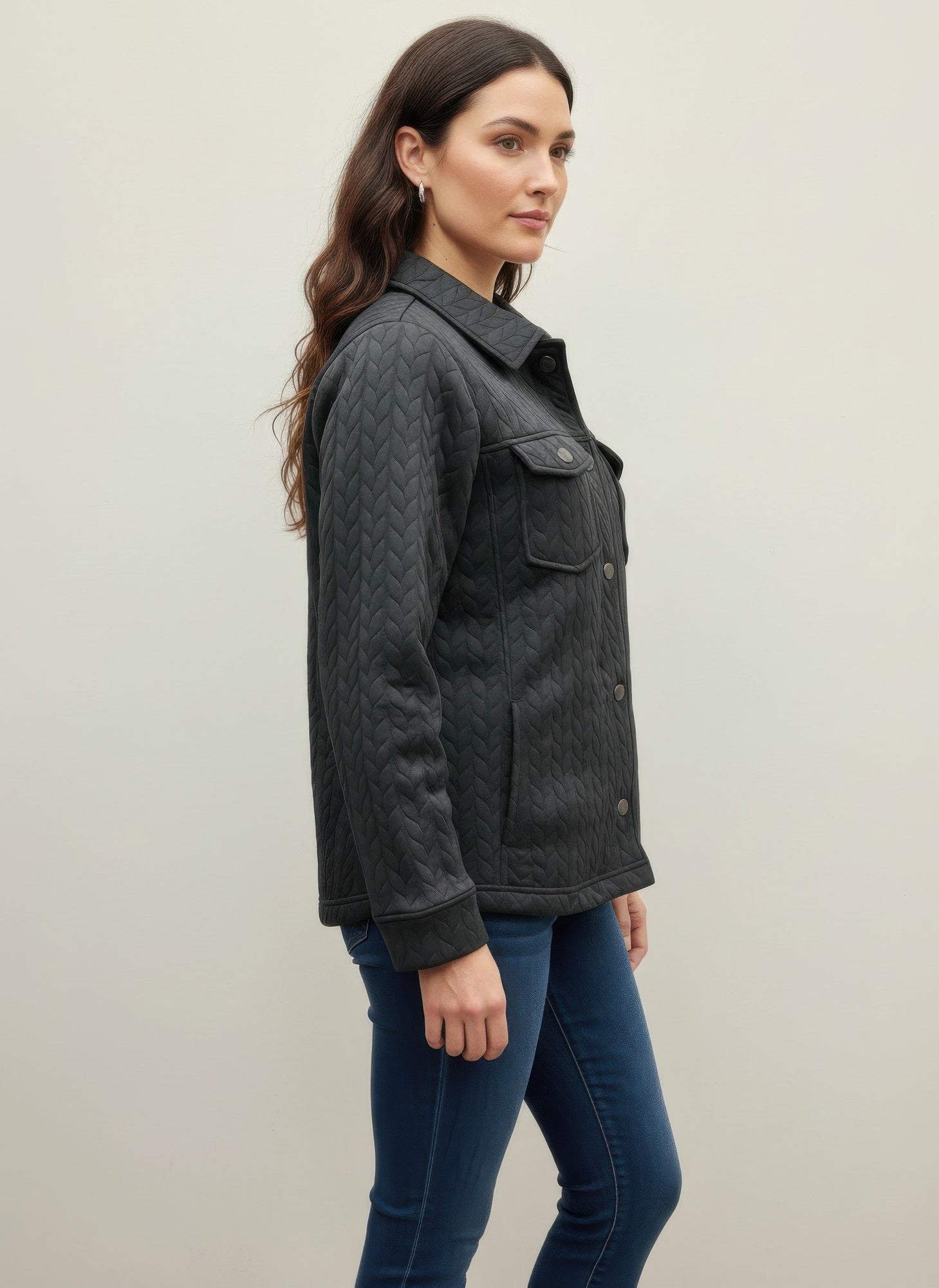 Casual textured jacket, black quilted side profile with chest flap pockets and snap buttons