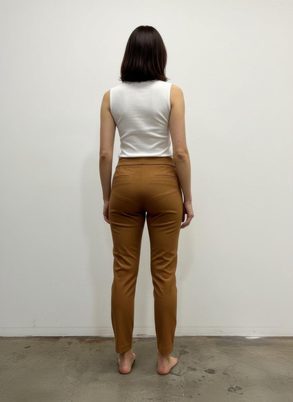 Back view of tobacco pull-on pants with tapered ankle-length legs