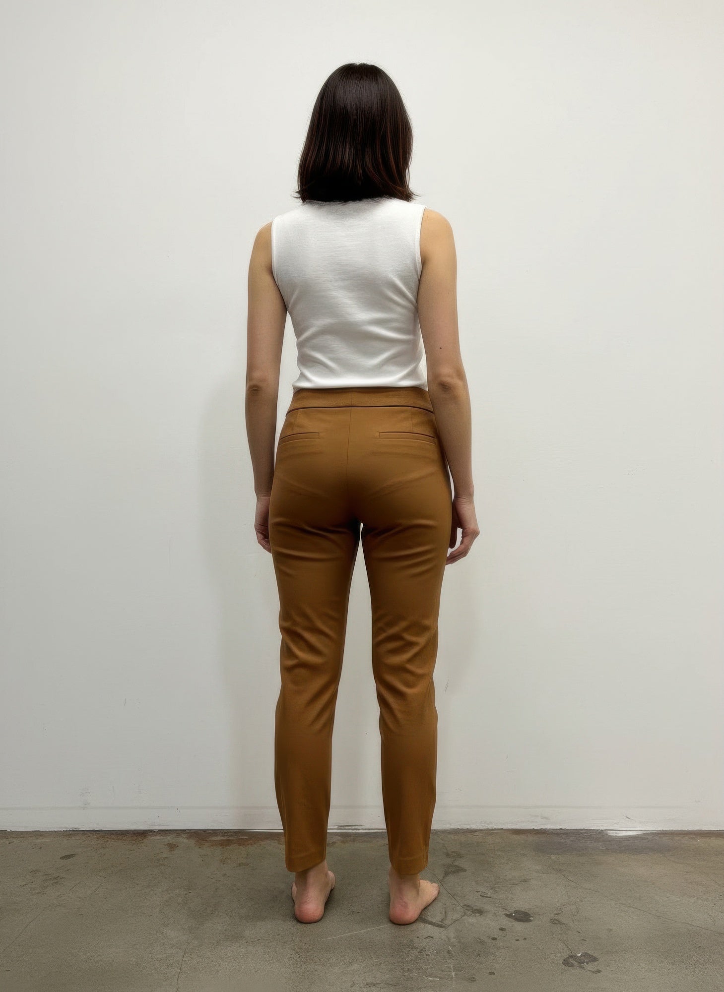 Back view of tobacco pull-on pants with tapered ankle-length legs