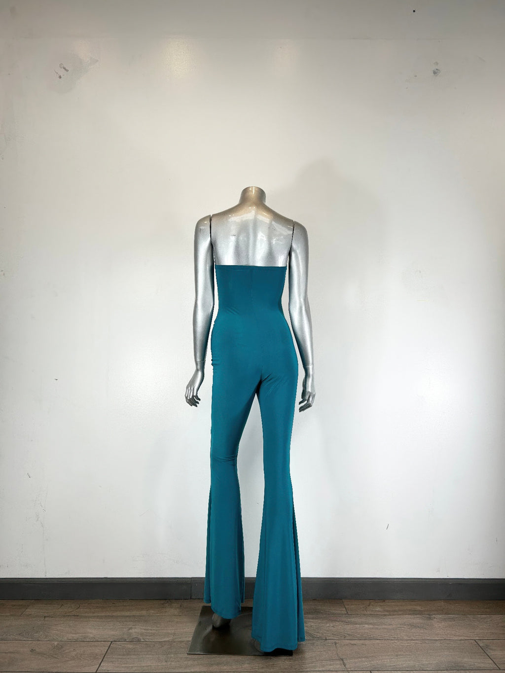 Teal strapless jumpsuit with ruched mid cut-out and wide flared legs