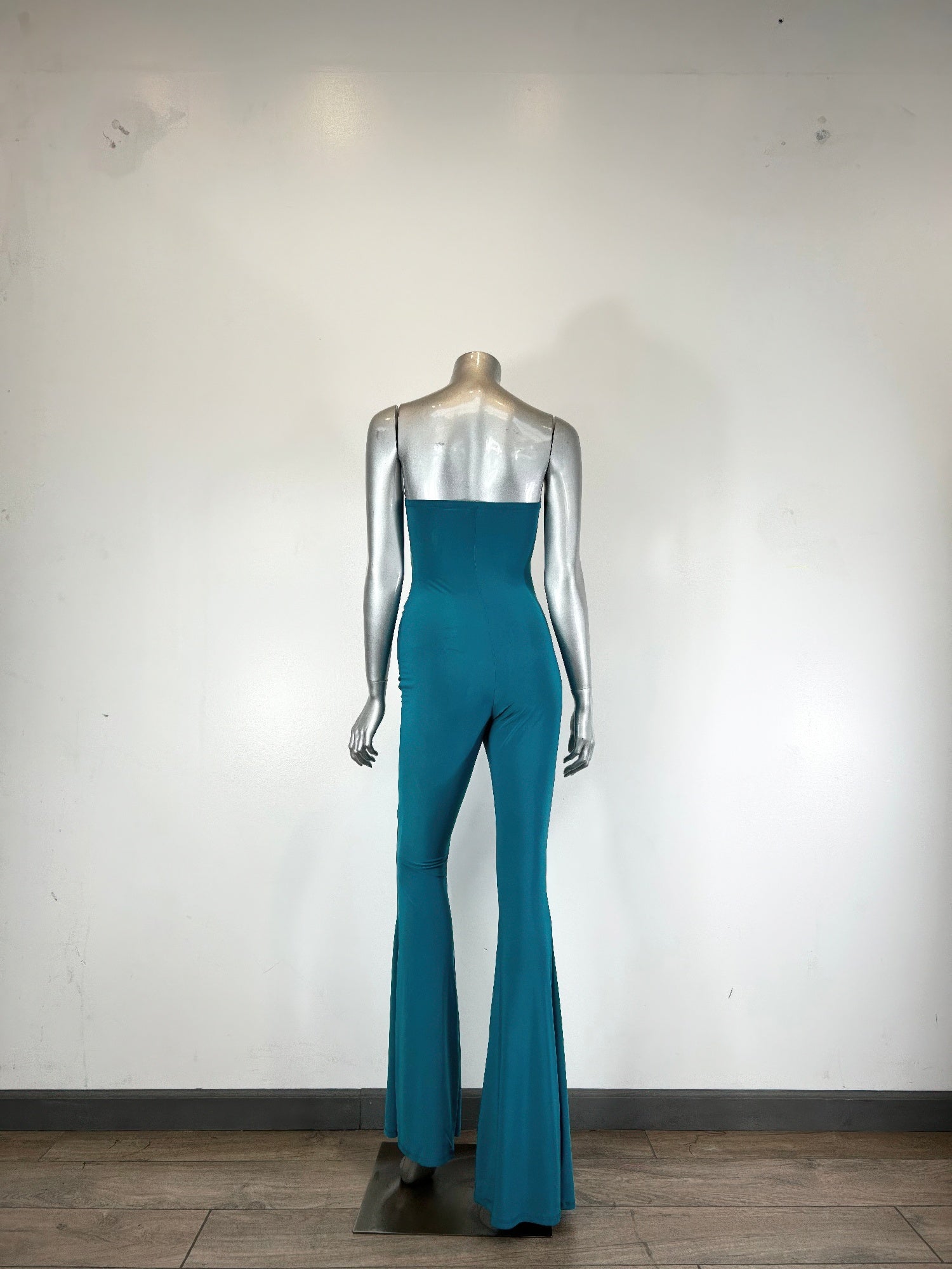 Teal strapless jumpsuit with ruched mid cut-out and wide flared legs