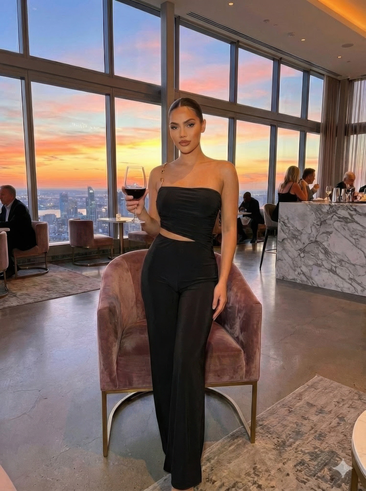 Black ruched bandeau jumpsuit, fitted strapless top and wide-leg pants