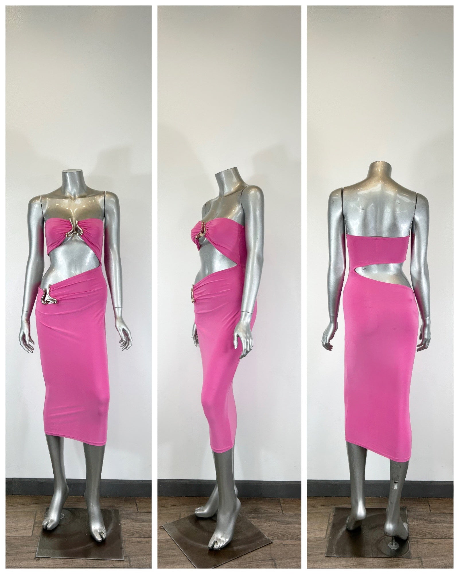 Fuchsia midi dress on mannequin: strapless triangular cutout top, ruched waist, side view
