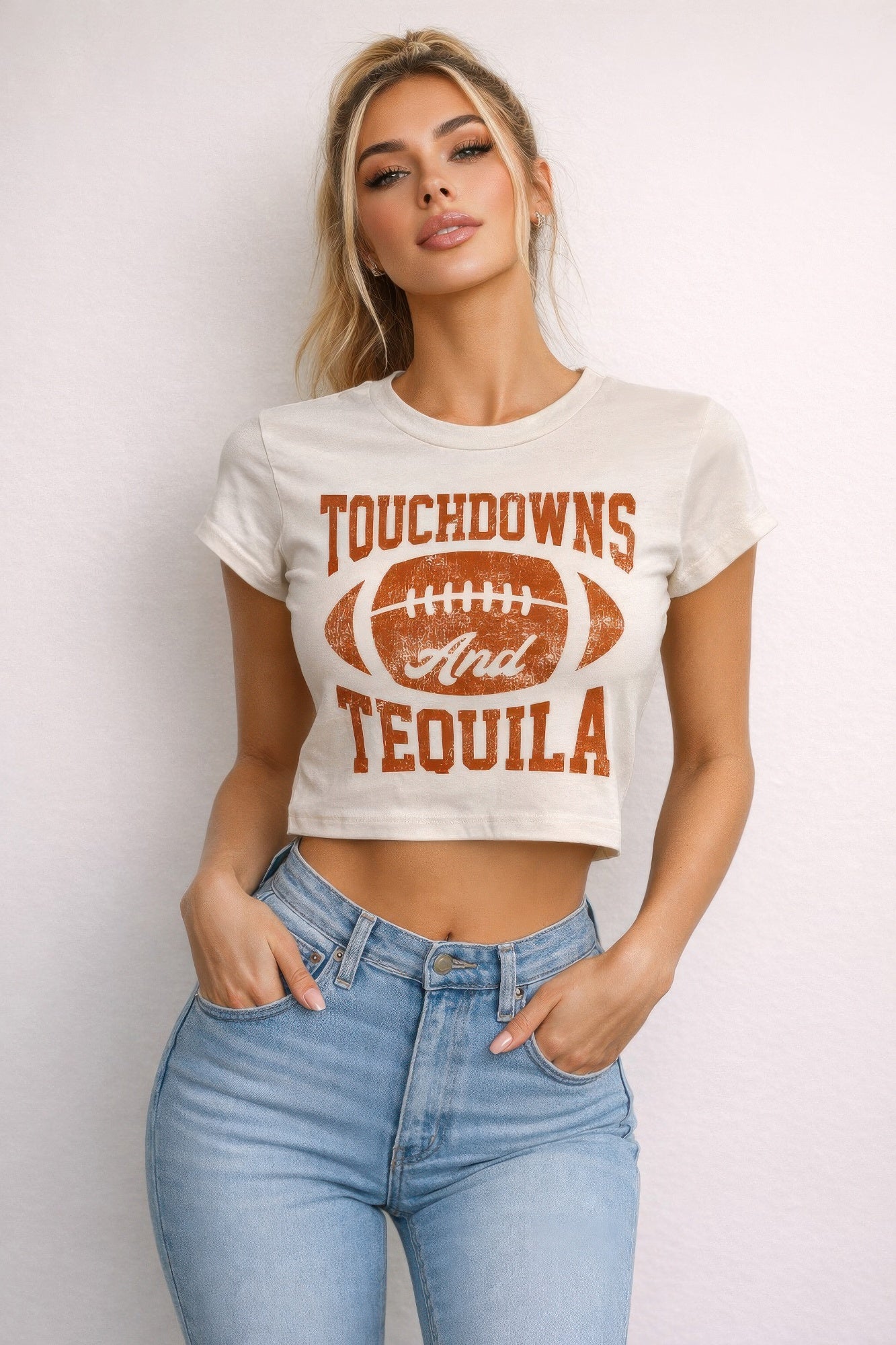 Cream crop tee with Touchdowns & Tequila football graphic