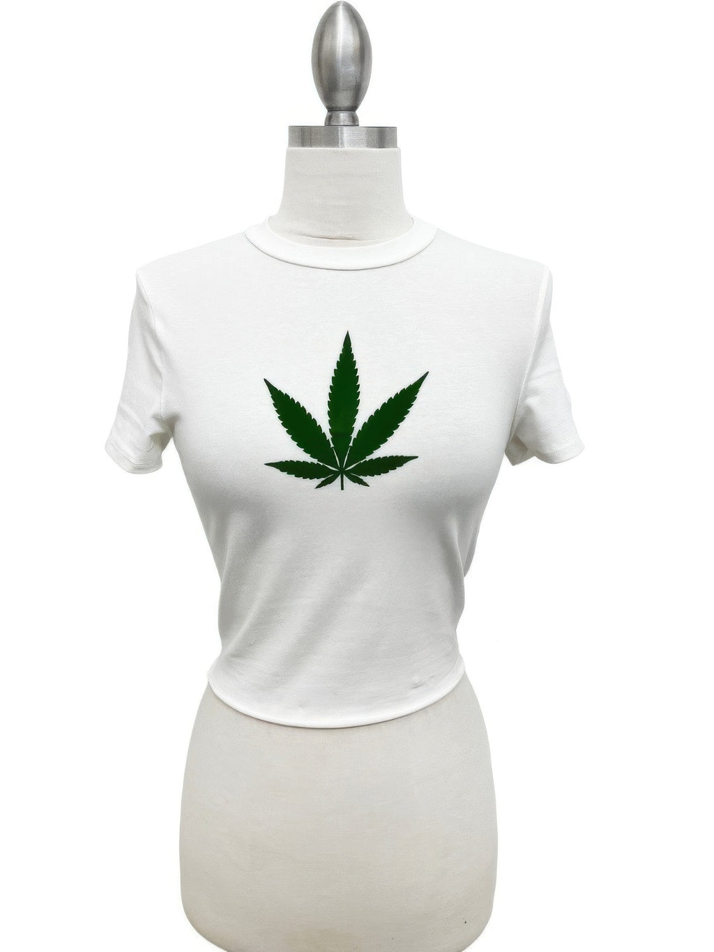 Ivory crop tee, green cannabis leaf print centered on front