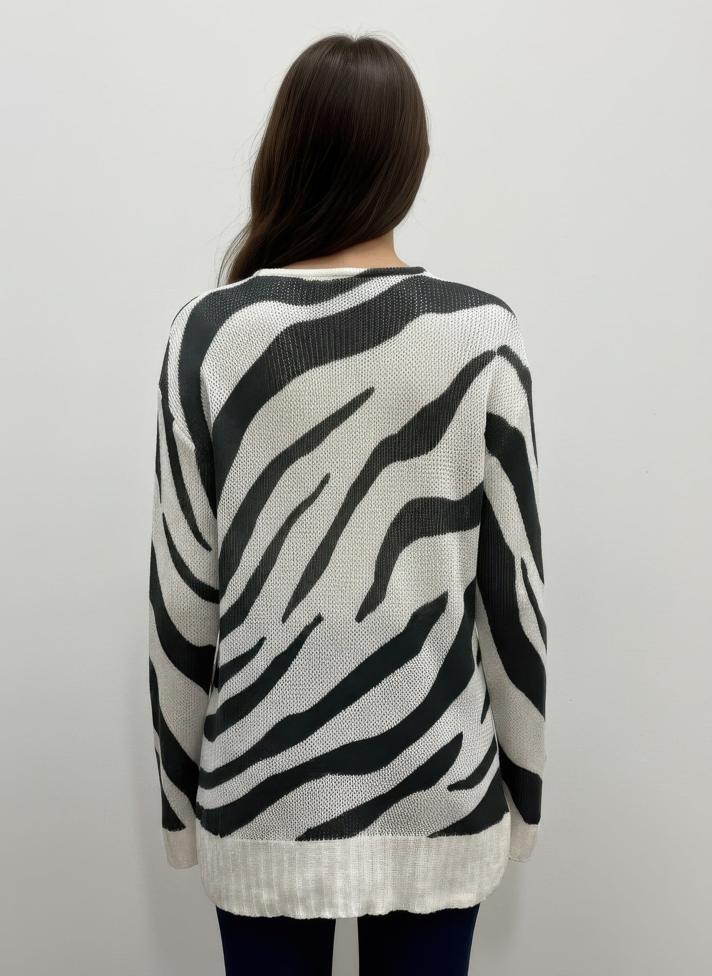 Pull-over sweater with zebra stripes, back view, ribbed hem and cuffs