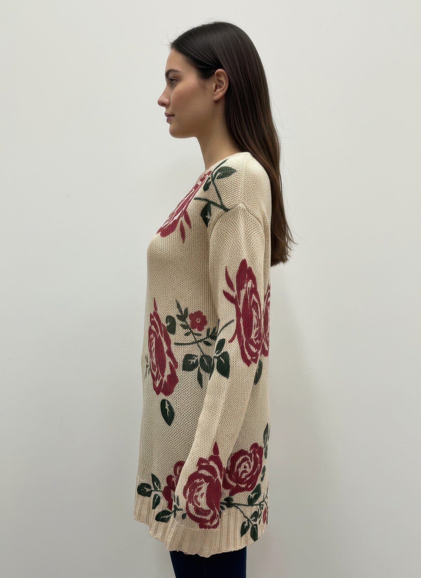 Pull-over sweater with floral rose print, long sleeves and ribbed hem, side view