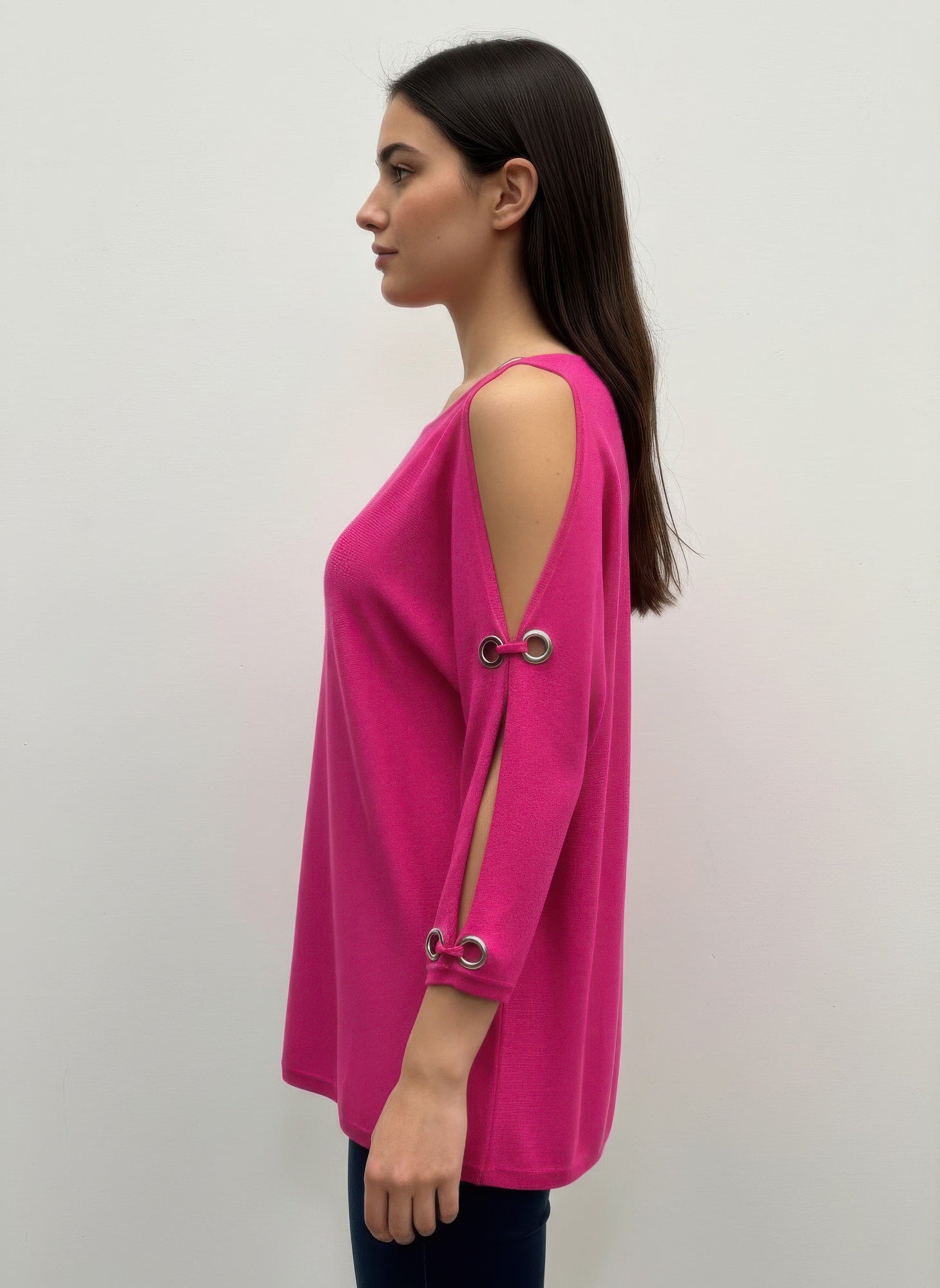 Pink pullover sweater with back shoulder opening and grommet ring on sleeve cuff