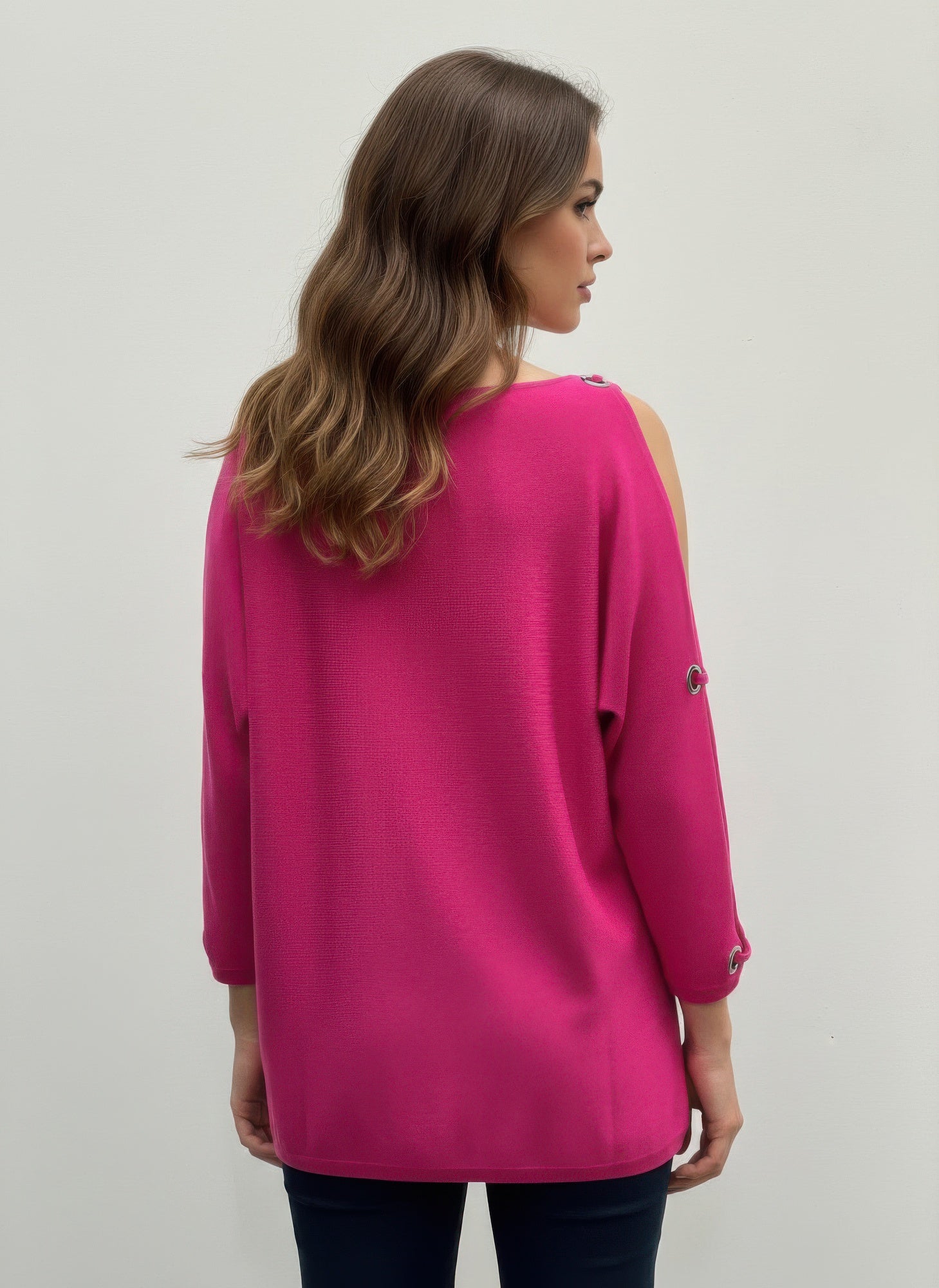 Pink cable knit pullover sweater, back view with open shoulder and sleeve eyelet accents