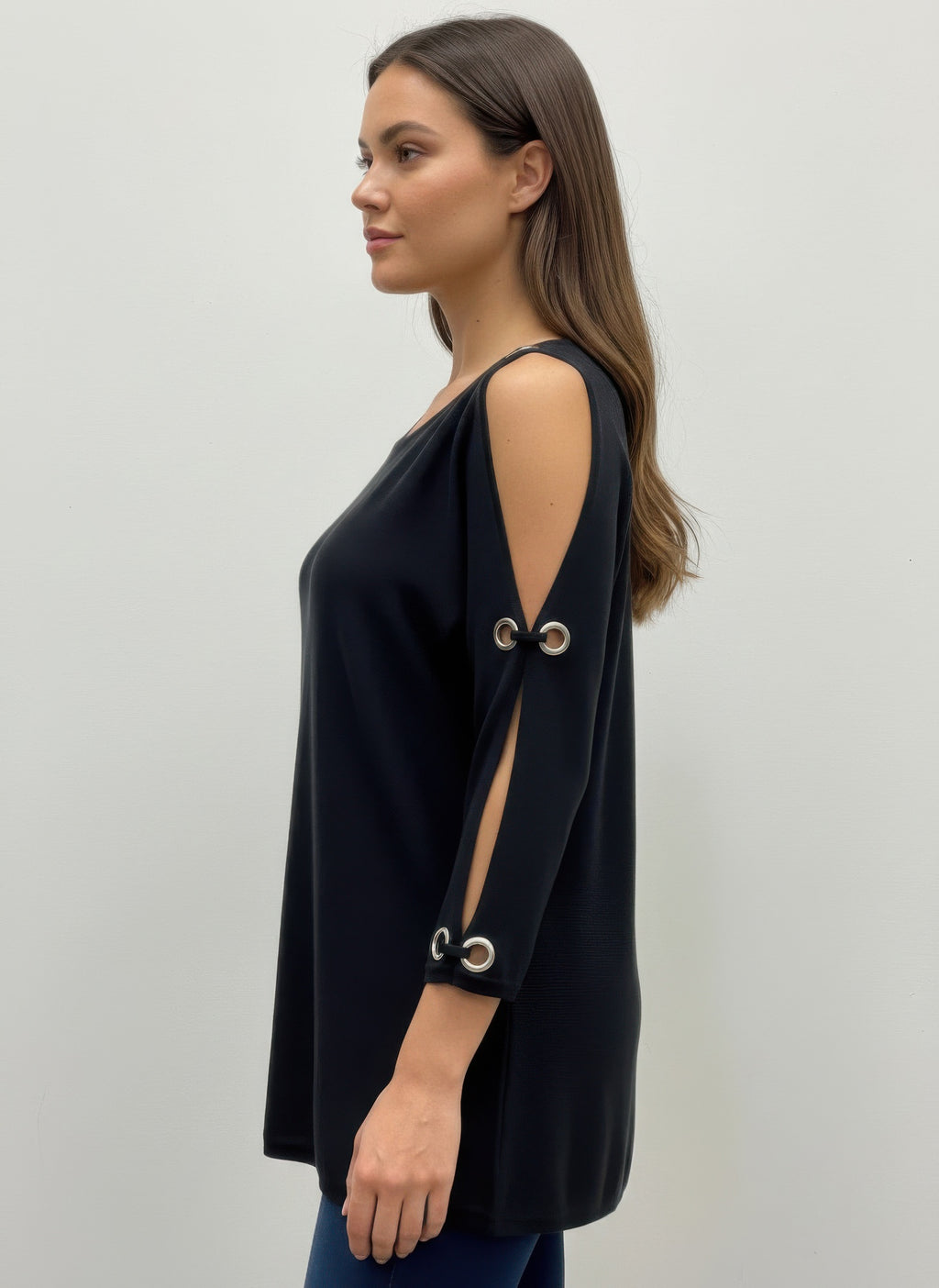 Black pullover sweater, side view with back shoulder opening and grommet ring detail