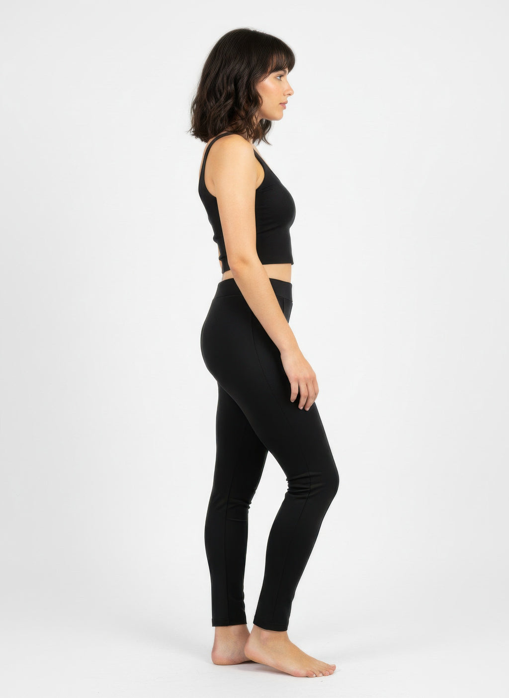 Black solid pull-on pants in a slim, tapered fit