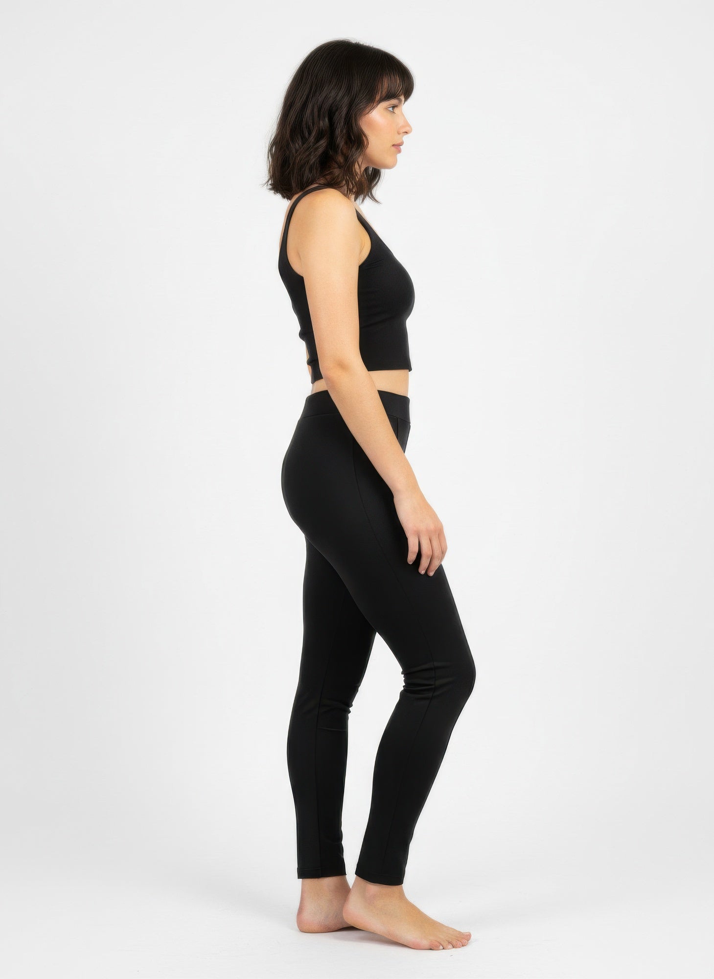 Black solid pull-on pants in a slim, tapered fit