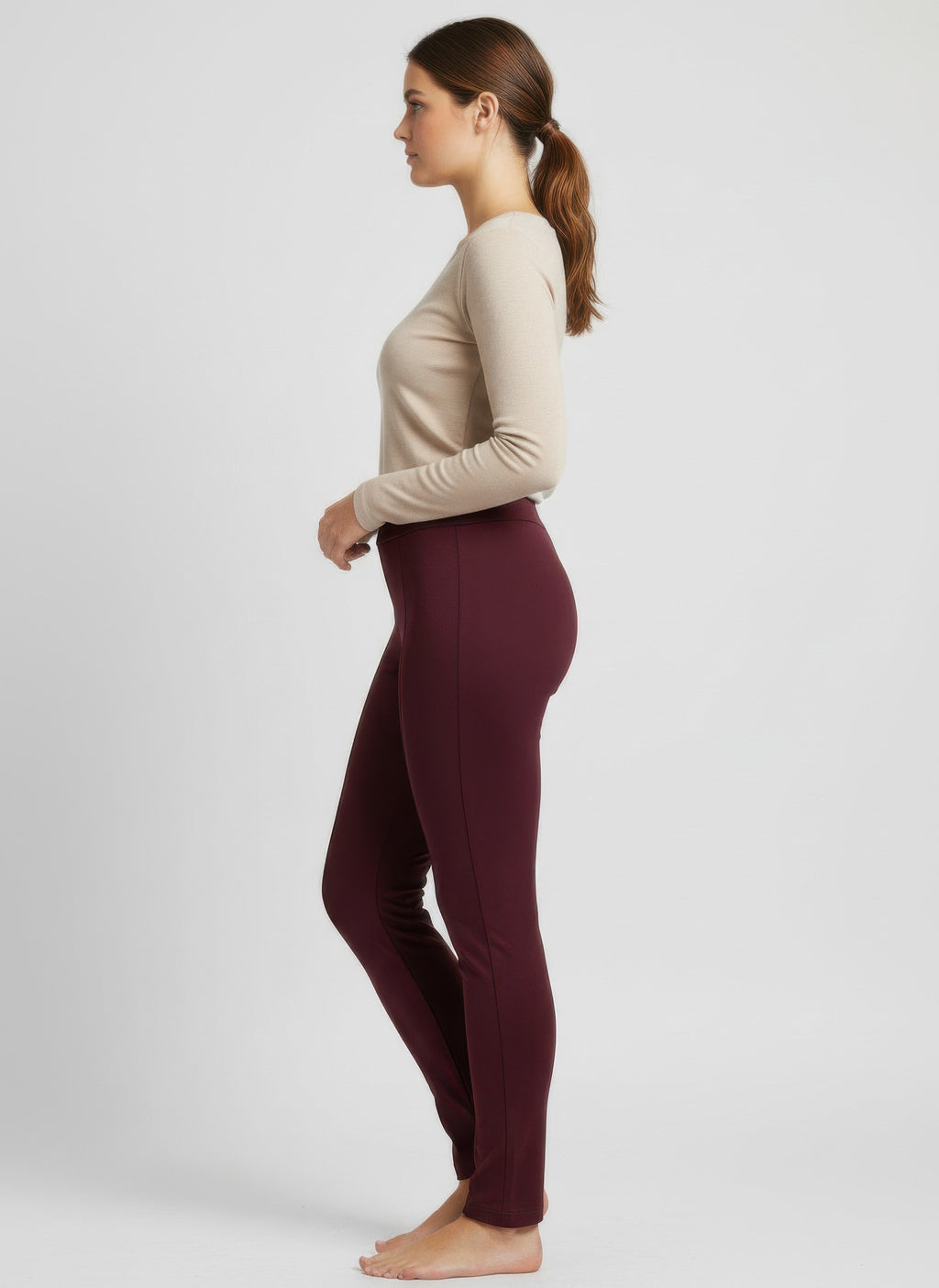 Side view solid pull-on pants with tapered leg, dark plum