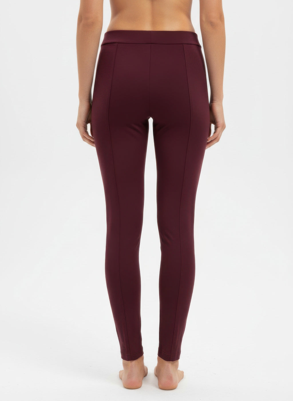 Close-up solid pull-on pants in dark plum, slim tapered fit