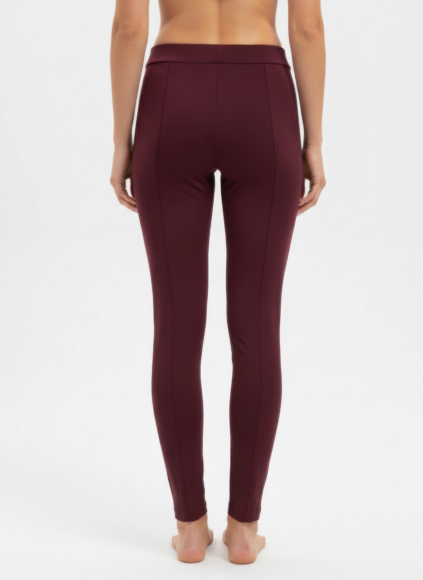Close-up solid pull-on pants in dark plum, slim tapered fit