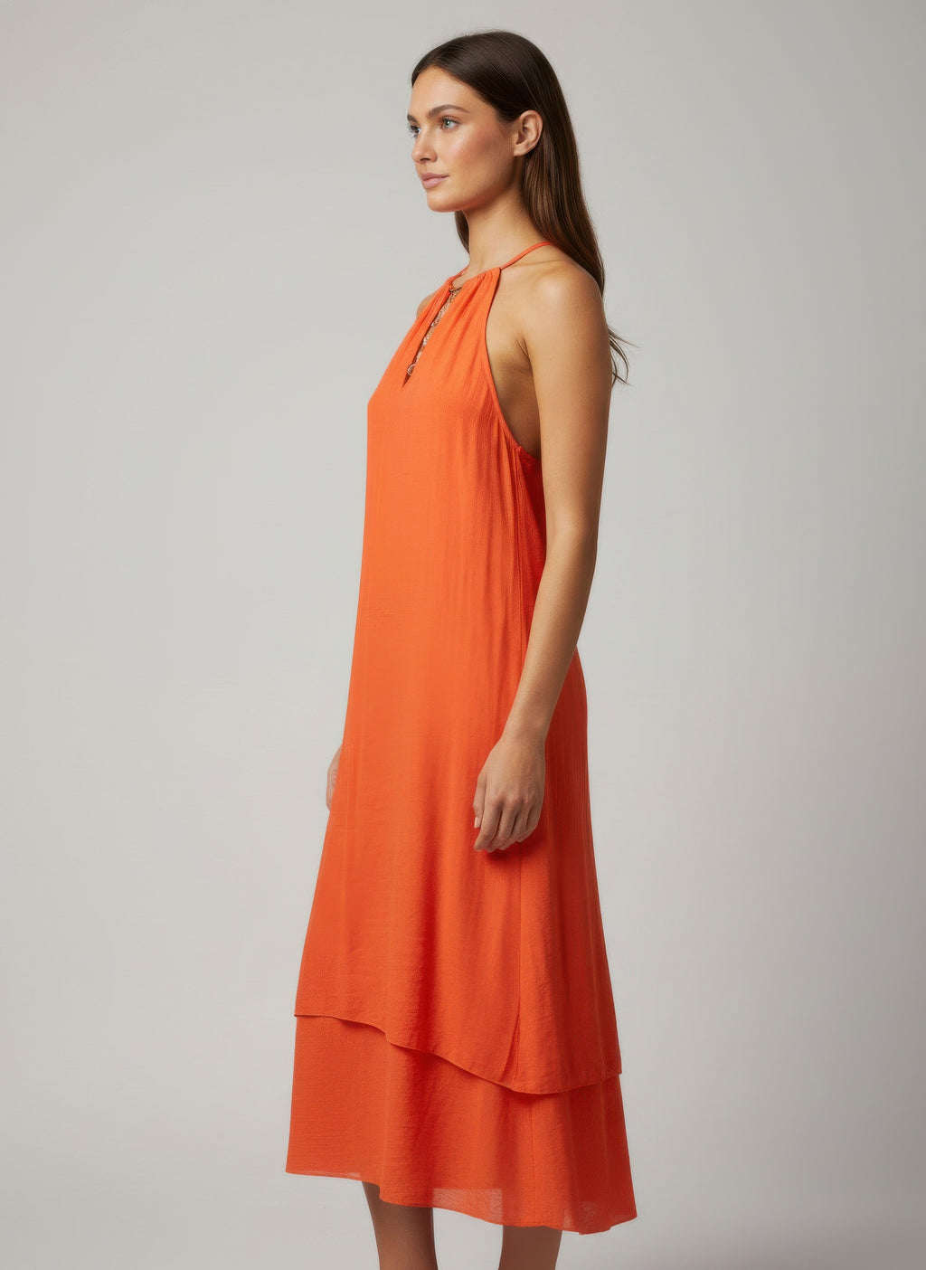 Orange solid sleeveless dress with tie neckline and tiered layered hem