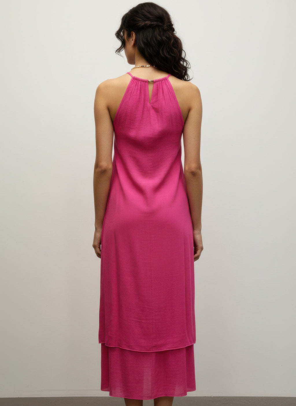 Fuchsia sleeveless midi dress, back view, keyhole halter neckline, tiered layers