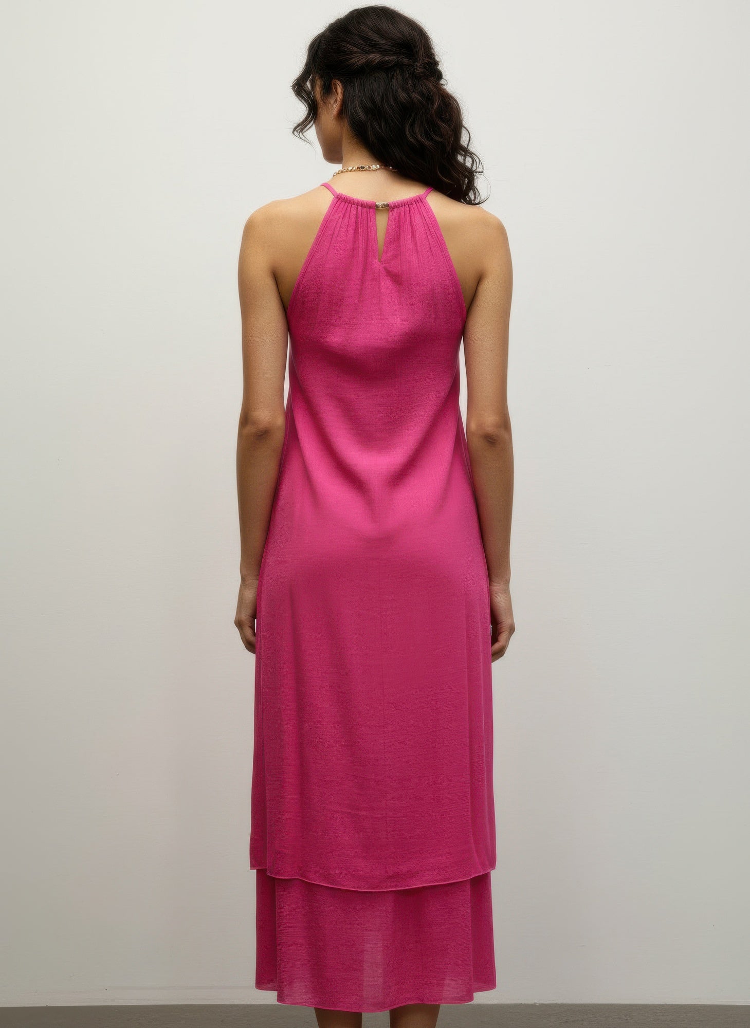 Fuchsia sleeveless midi dress, back view, keyhole halter neckline, tiered layers