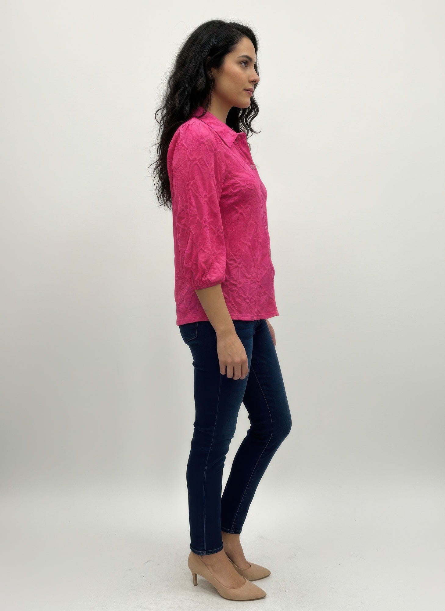 Fuchsia 3/4 sleeve blouse, side view; button front and folded cuffs