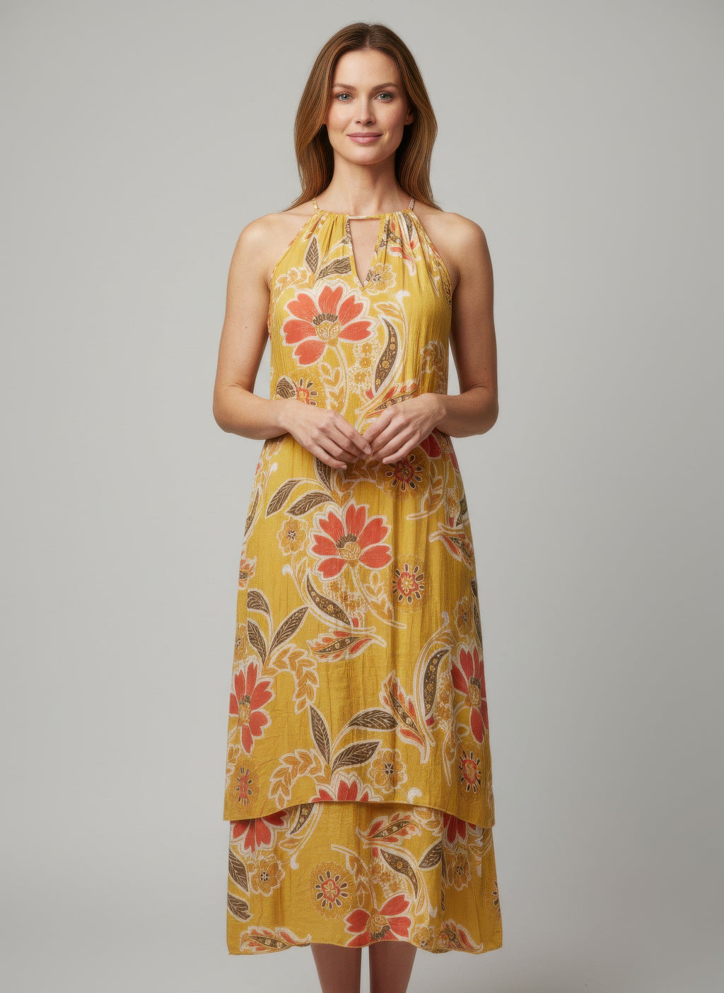Floral sleeveless dress with halter neckline in mustard yellow and red-orange blooms