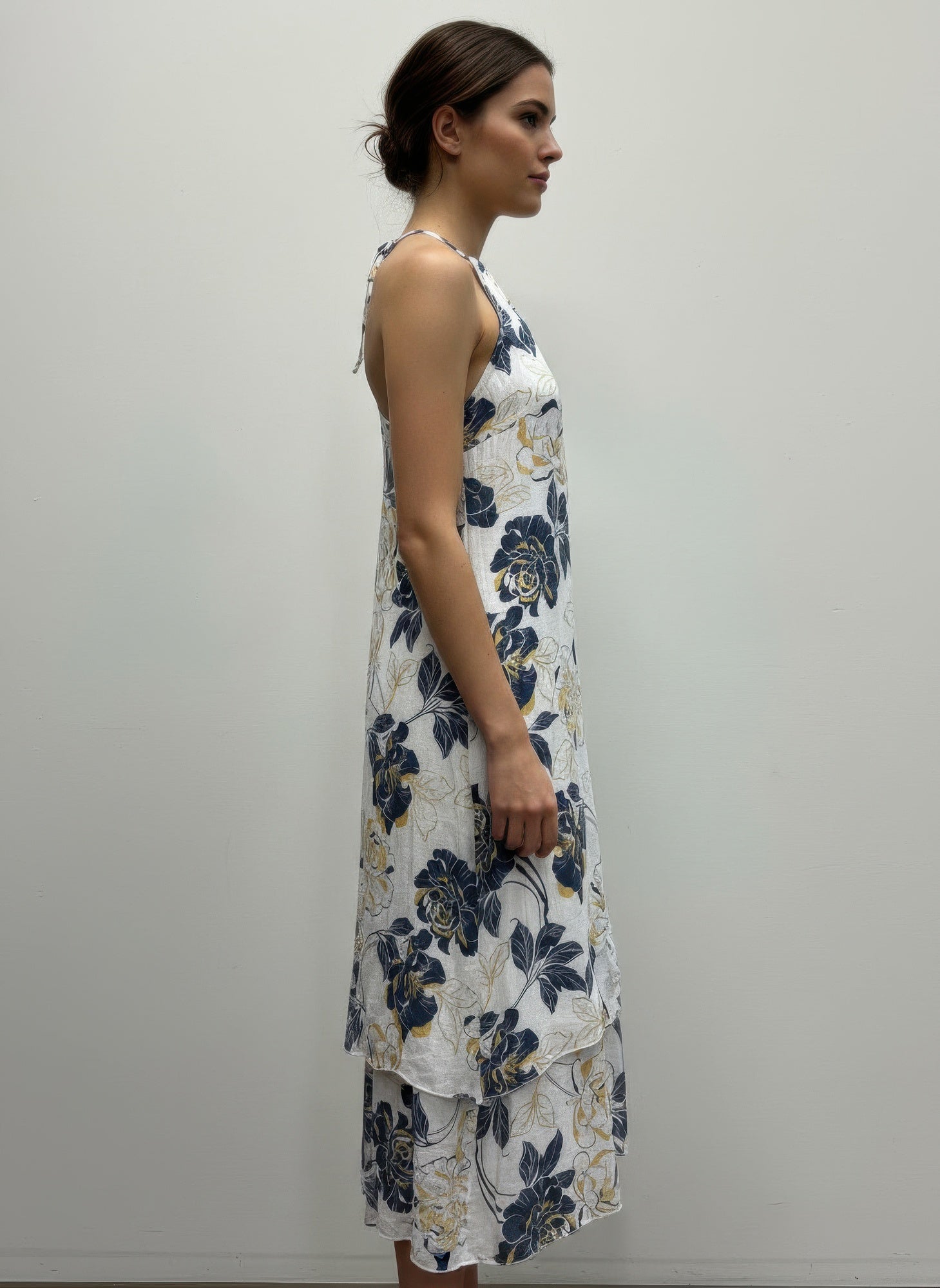 Floral sleeveless halter midi dress, side view, blue and yellow flower print