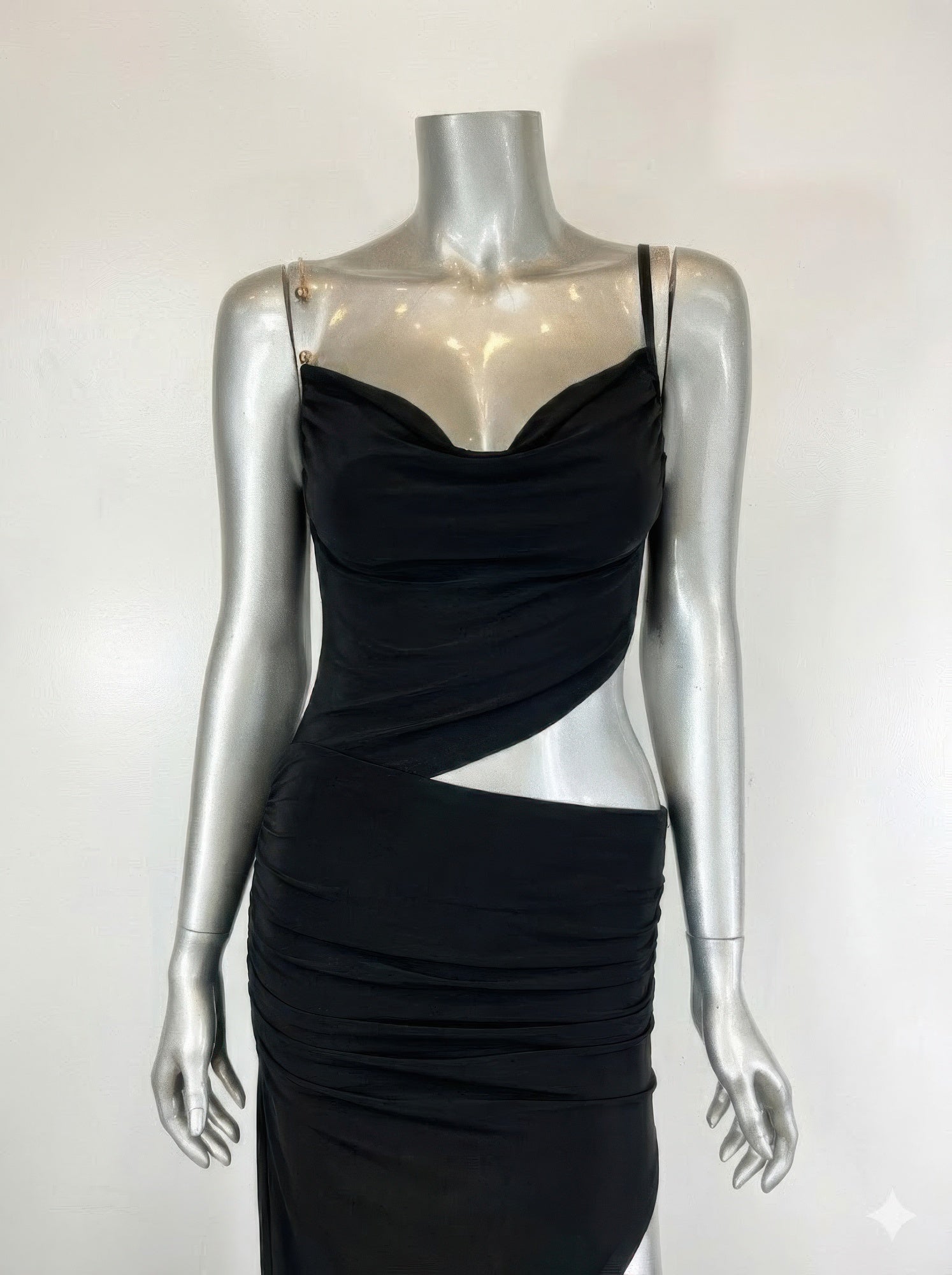 Black cowl-neck midi dress on mannequin, draped bust, ruched body, side slit