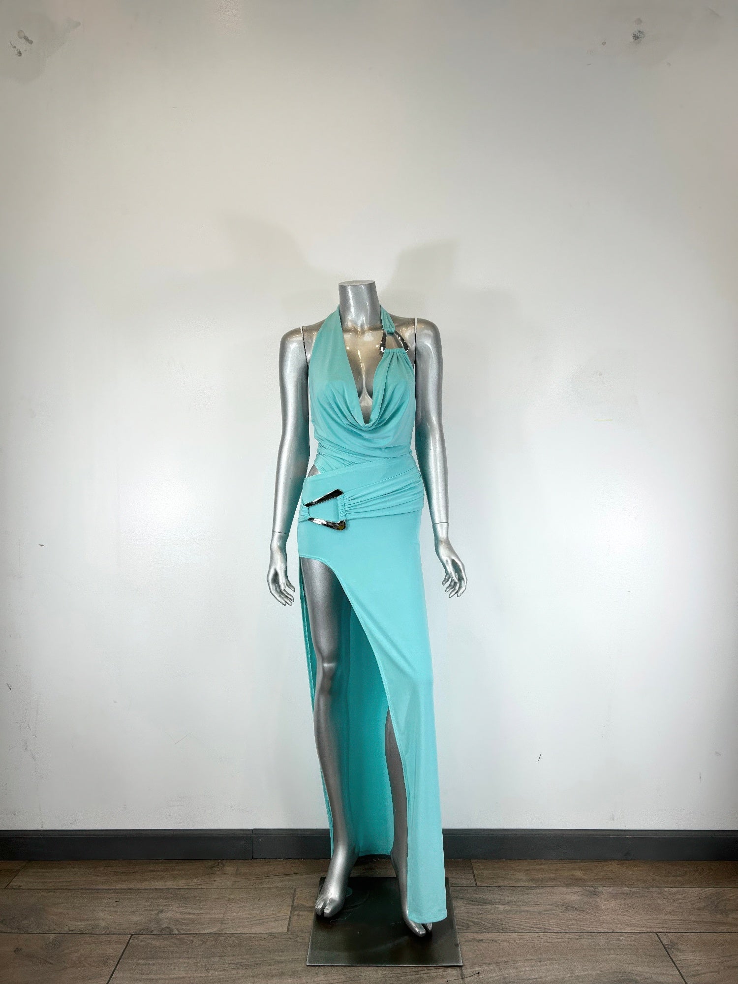 Aqua halter body suit and skirt set on mannequin, ruched waist and thigh-high slit