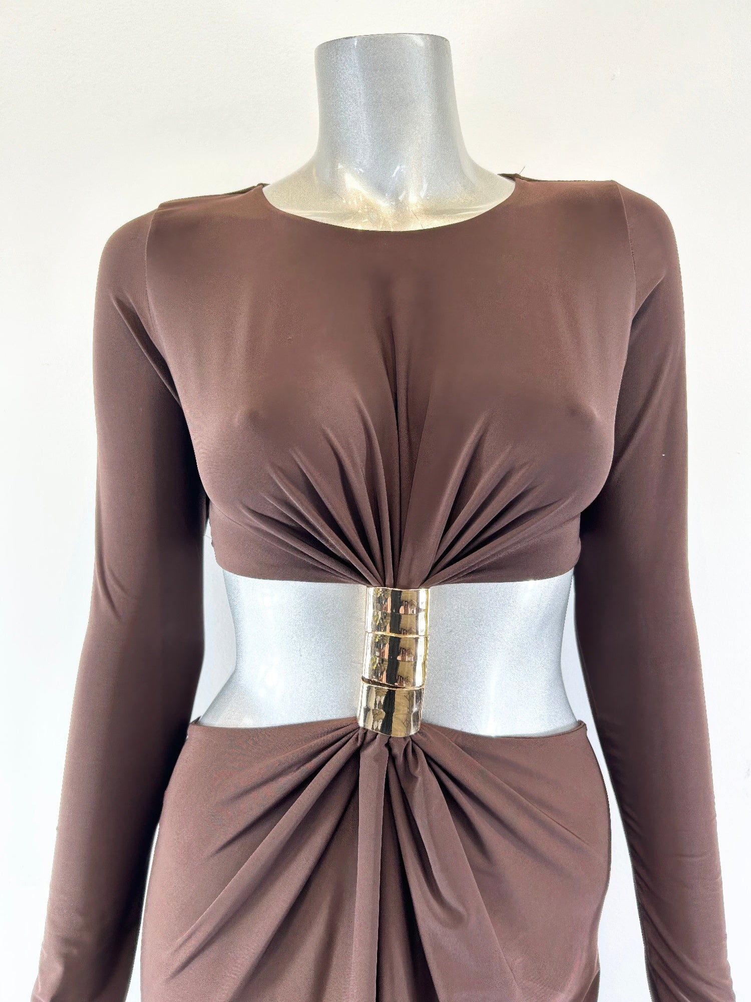 Dark brown long-sleeve mockneck maxi dress close-up, gold buckle at gathered waist
