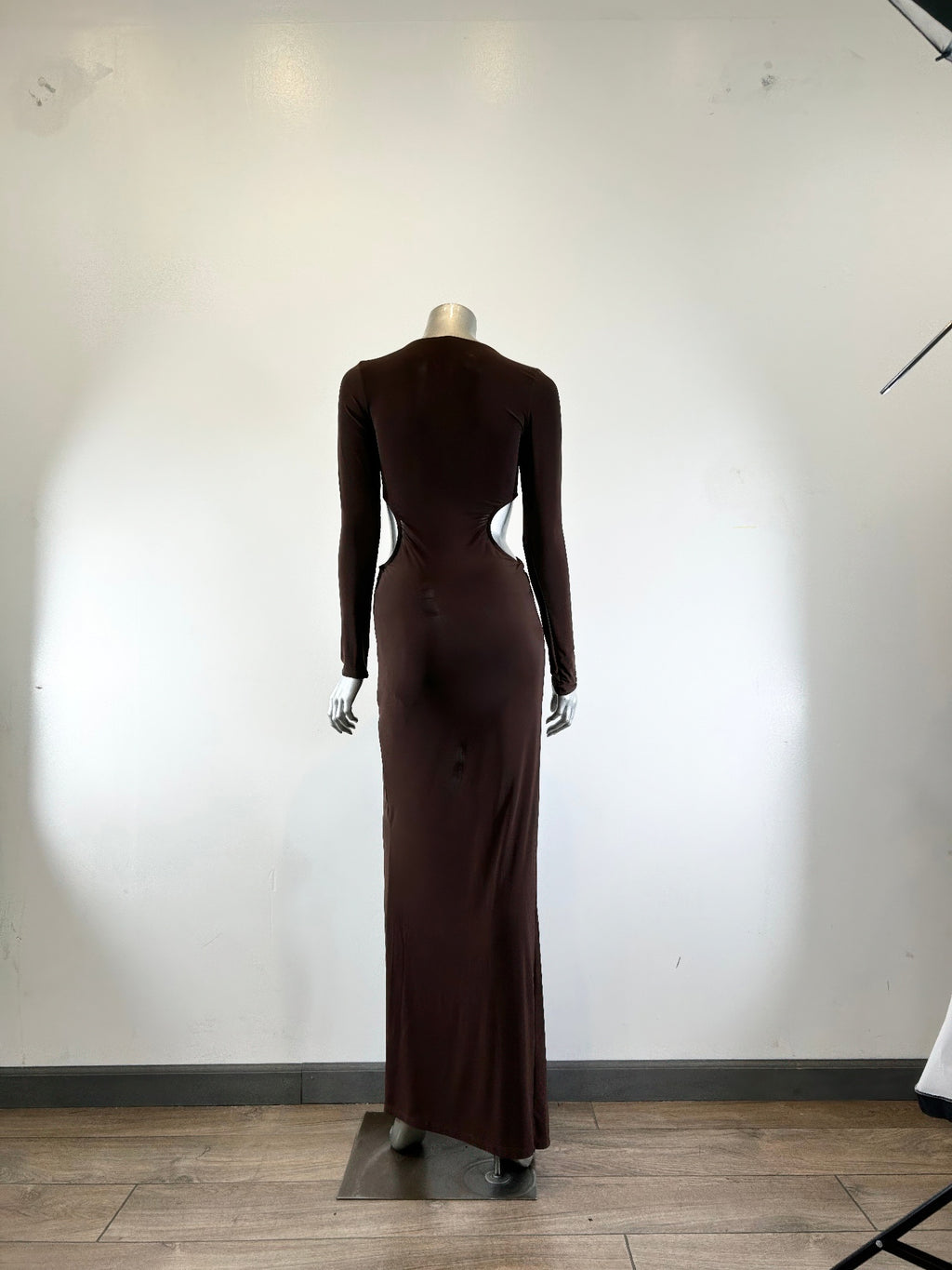 Back view of dark brown mockneck maxi dress on mannequin, long sleeves