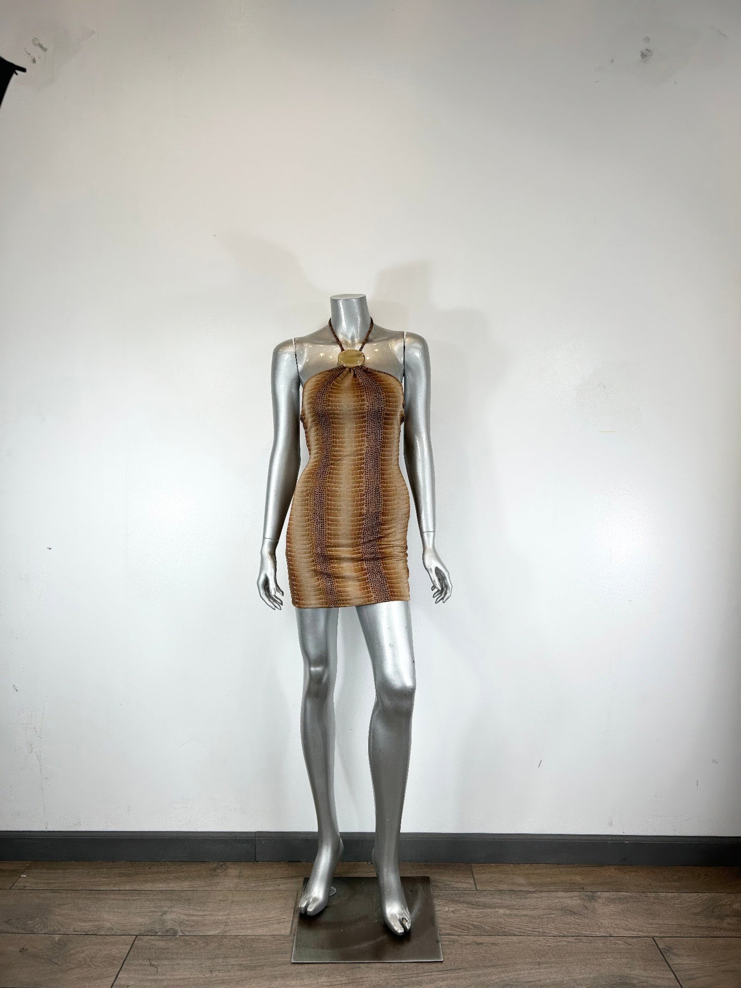 Bronze/gold mini dress with string neck and trim detail, side front view