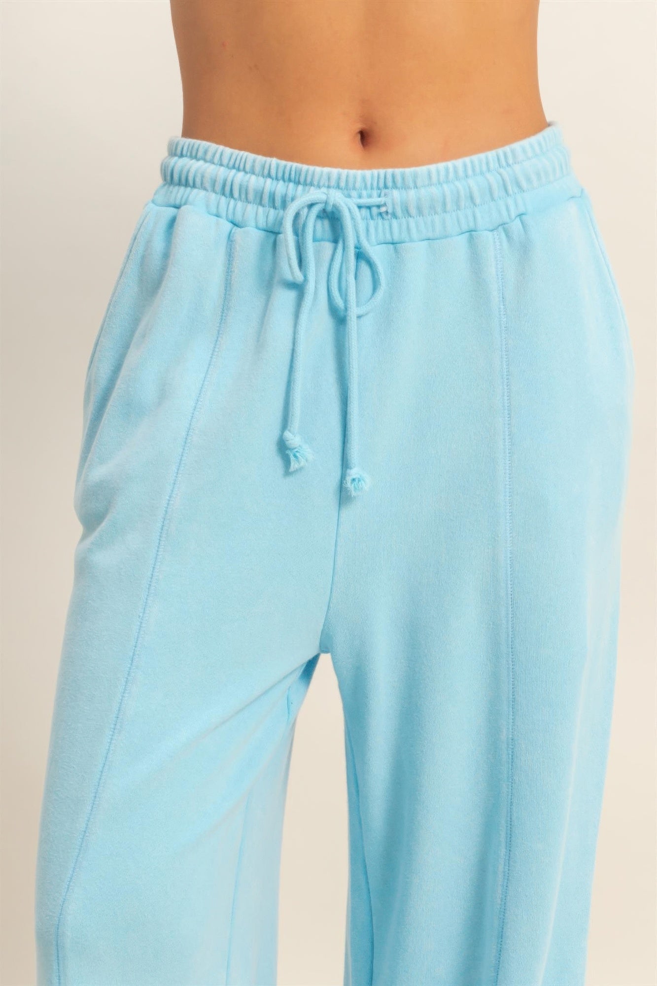 Light blue French terry wide-leg pants, elastic waistband and knotted drawstring