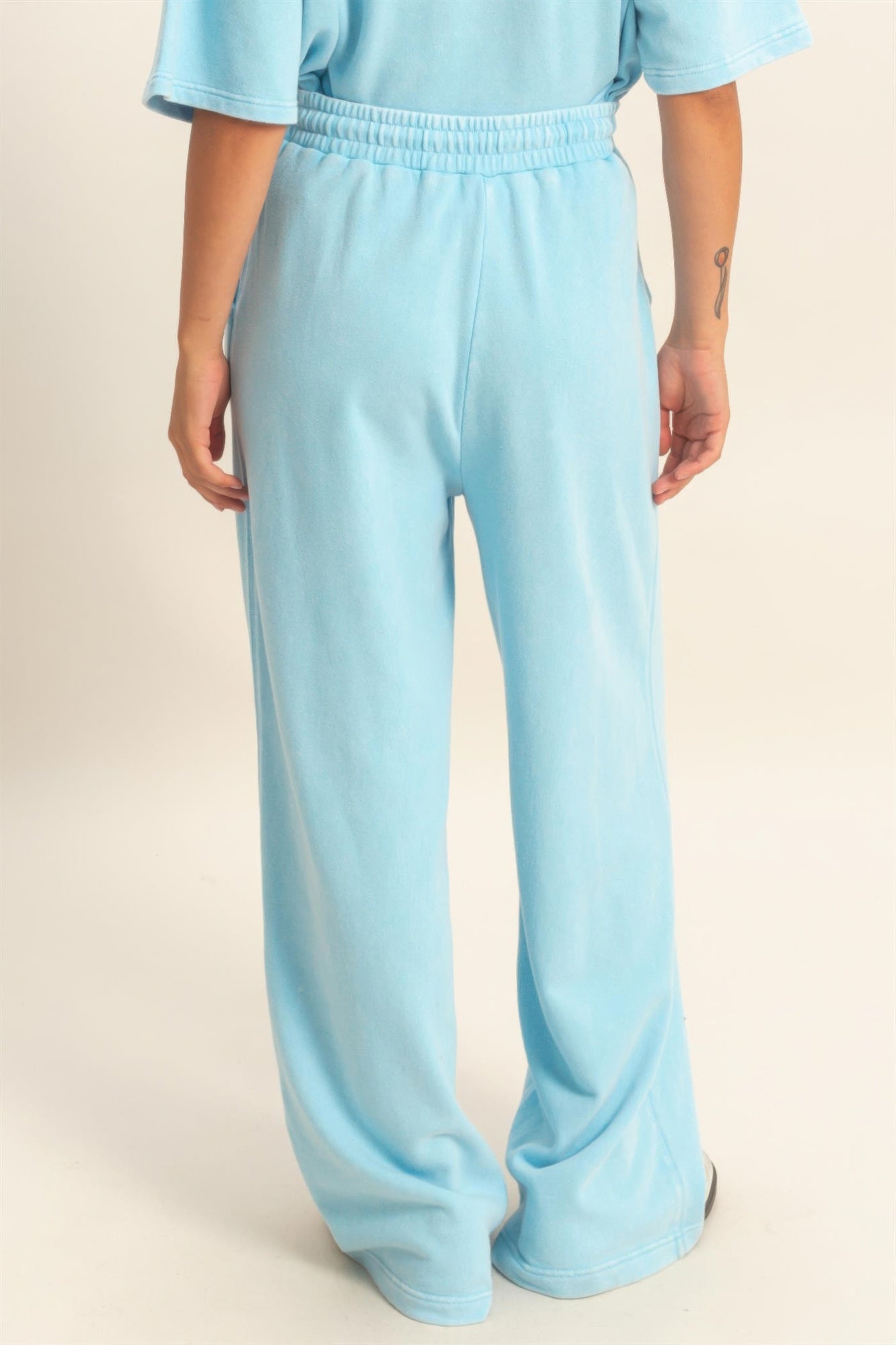 Light blue wide-leg French terry pants, relaxed wide silhouette with elastic waist