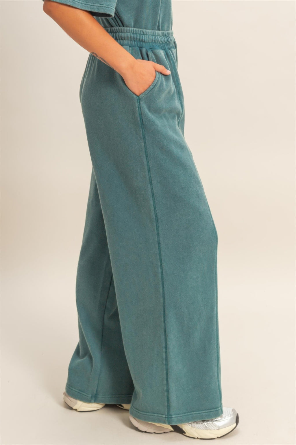 Dark teal wide-leg sweatpants, French terry knit, seam details and drawstring waist