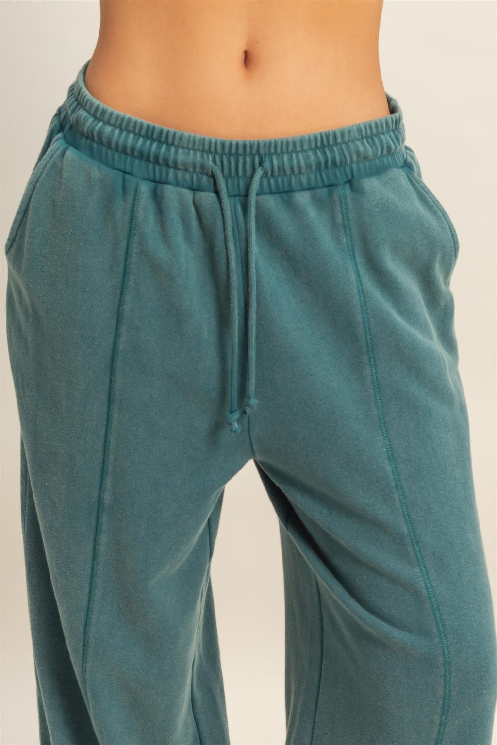 Dark teal French terry wide-leg pants: elastic waistband, front drawstring, side pockets