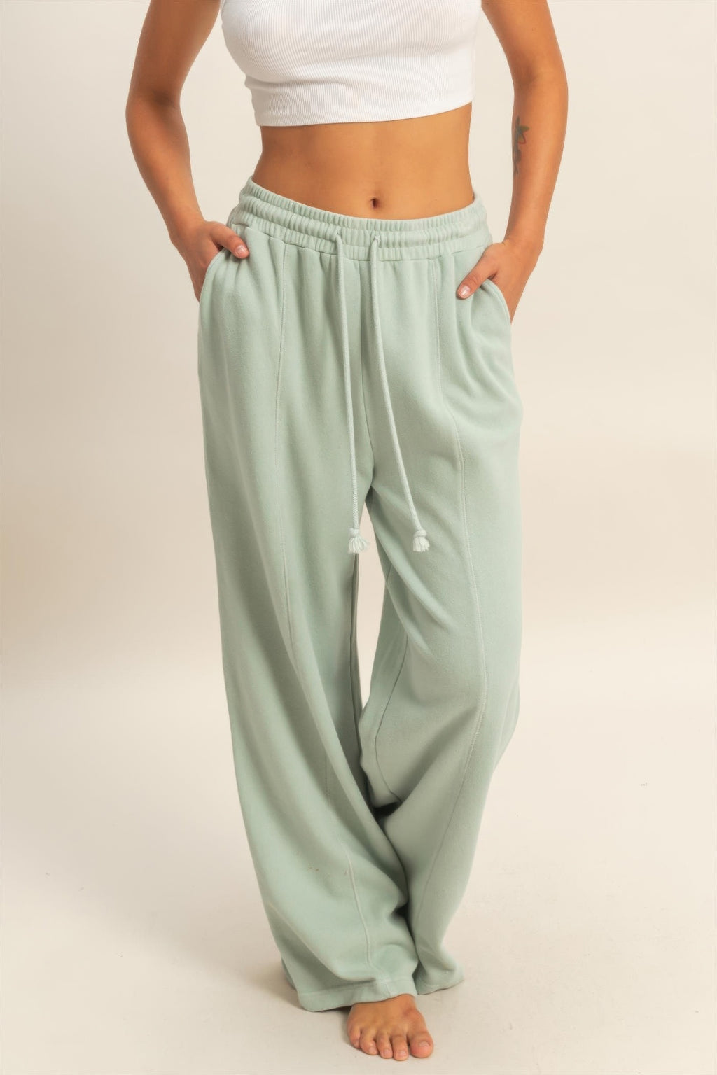 Acid wash French terry wide-leg pants in light mint green, elastic waist with drawstring