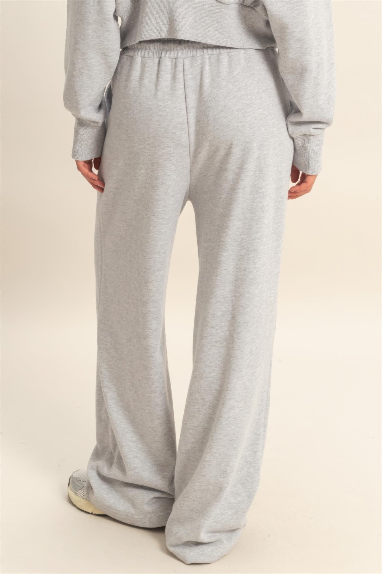Heather grey wide-leg French terry pants with relaxed, roomy leg opening
