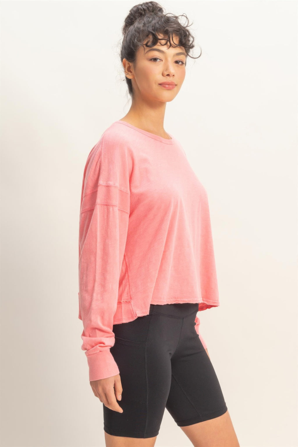 Taffy pink long-sleeve top, loose fit, V-back opening with cross detail