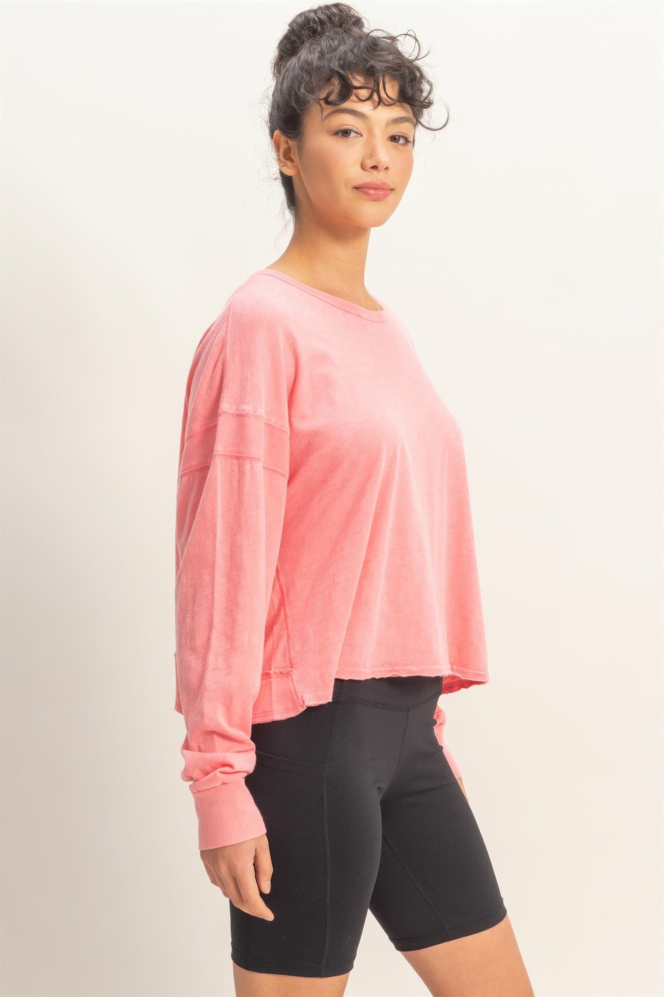 Taffy pink long-sleeve top, loose fit, V-back opening with cross detail