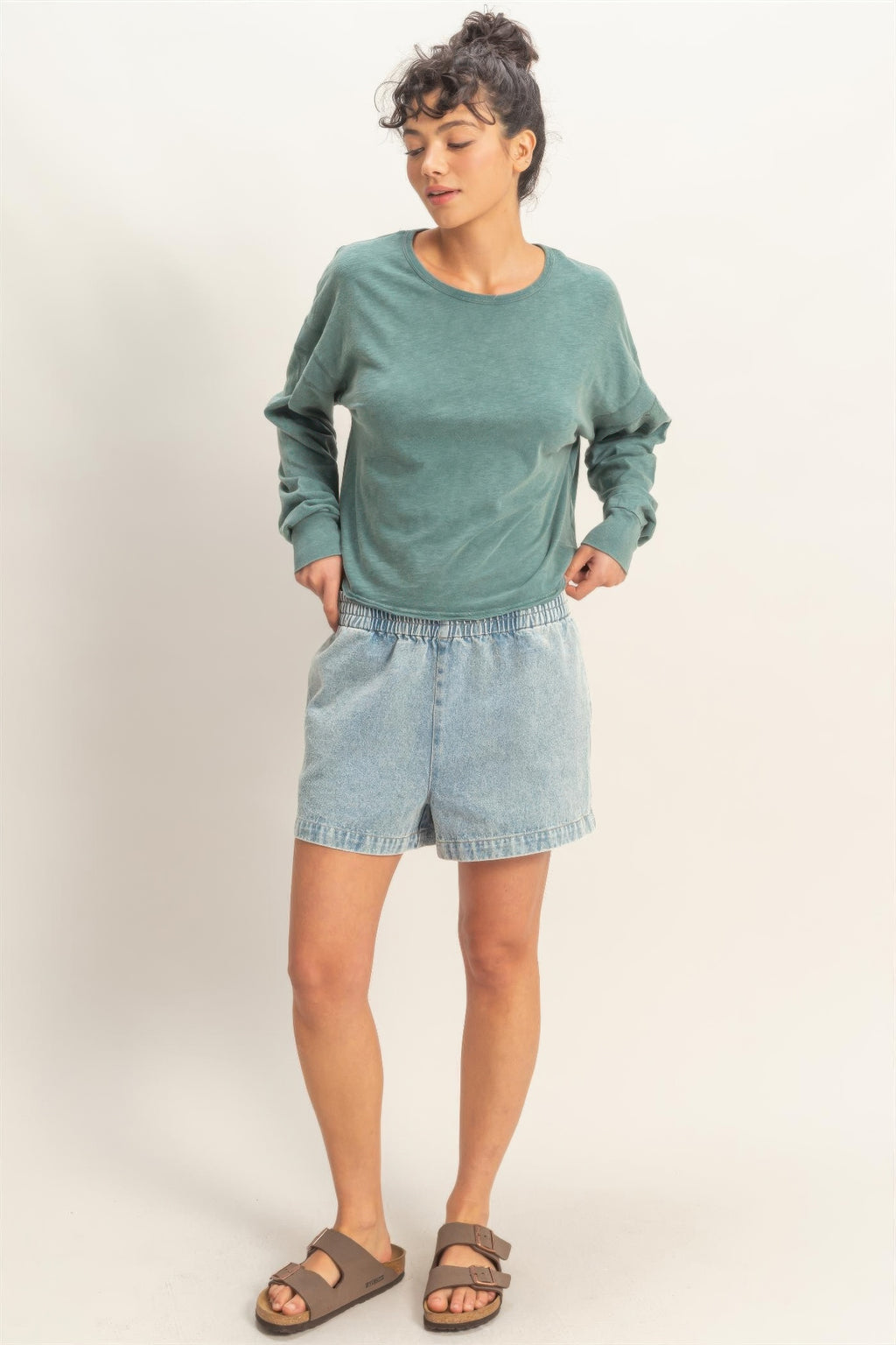 Cross detail open-back long-sleeve top in dark teal, relaxed fit