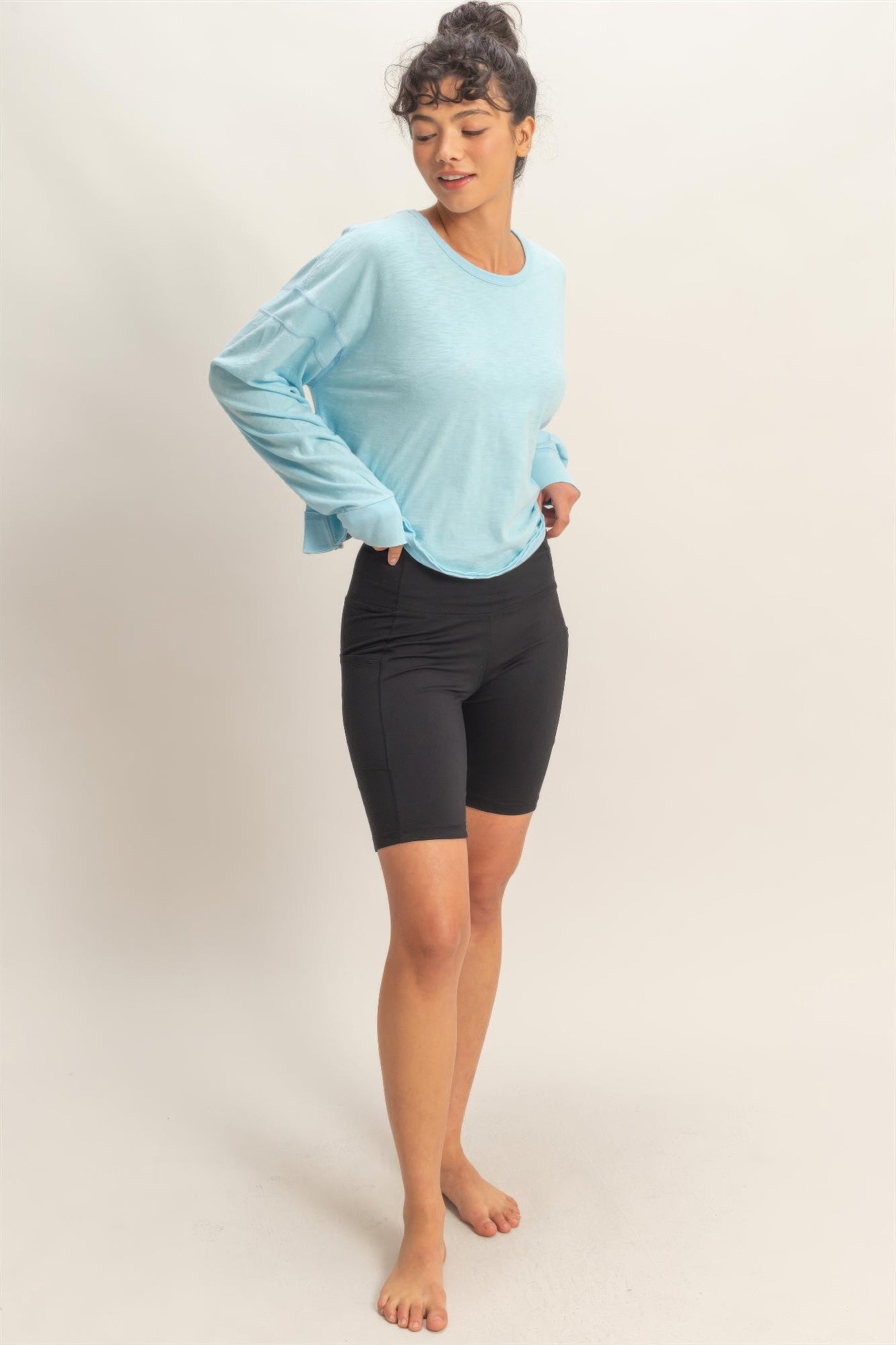 Light blue cross detail open-back long-sleeve top, long sleeves