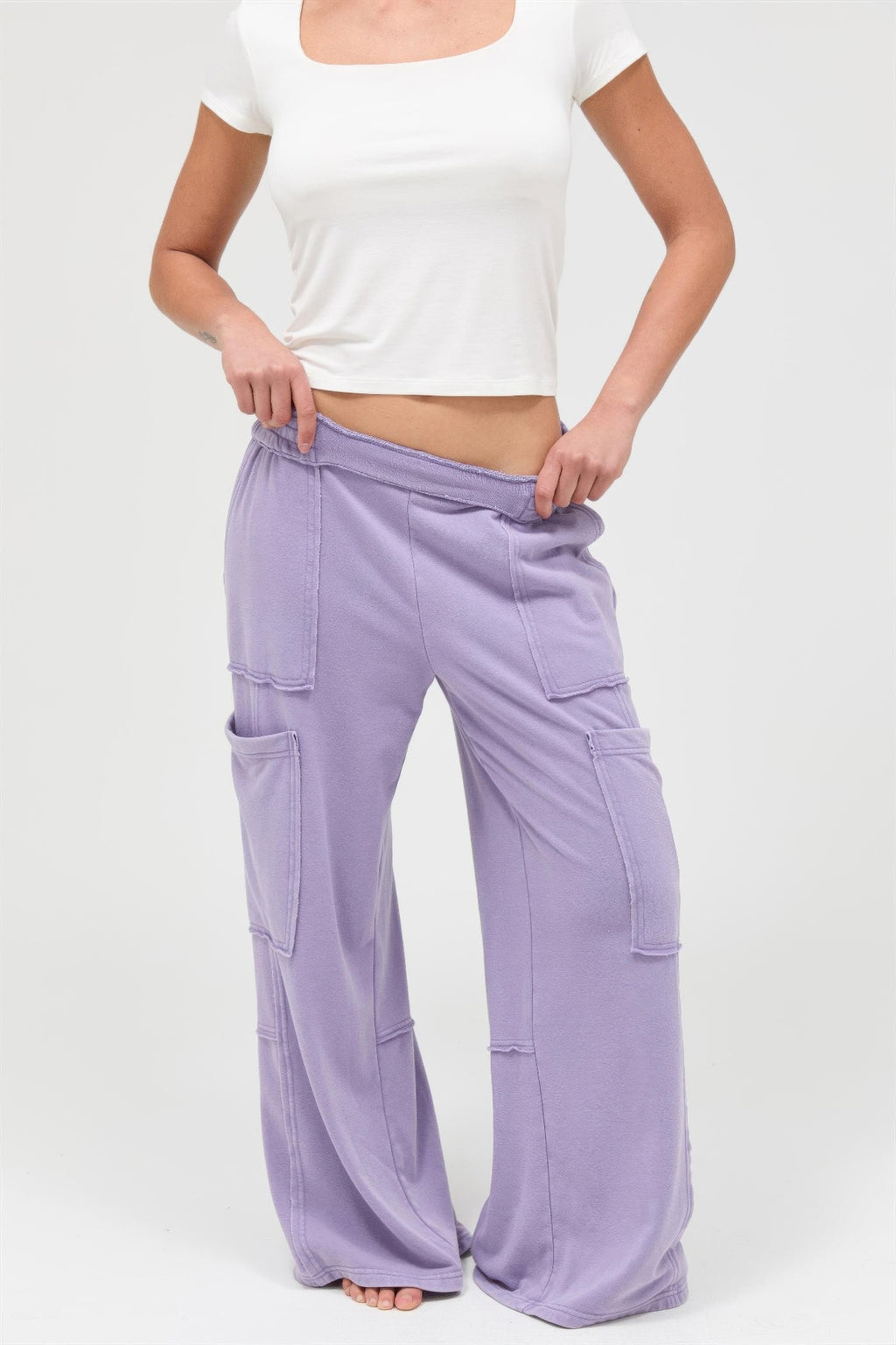Mineral wash wide-leg cargo pants in dusty purple, front with cargo pockets and wide leg